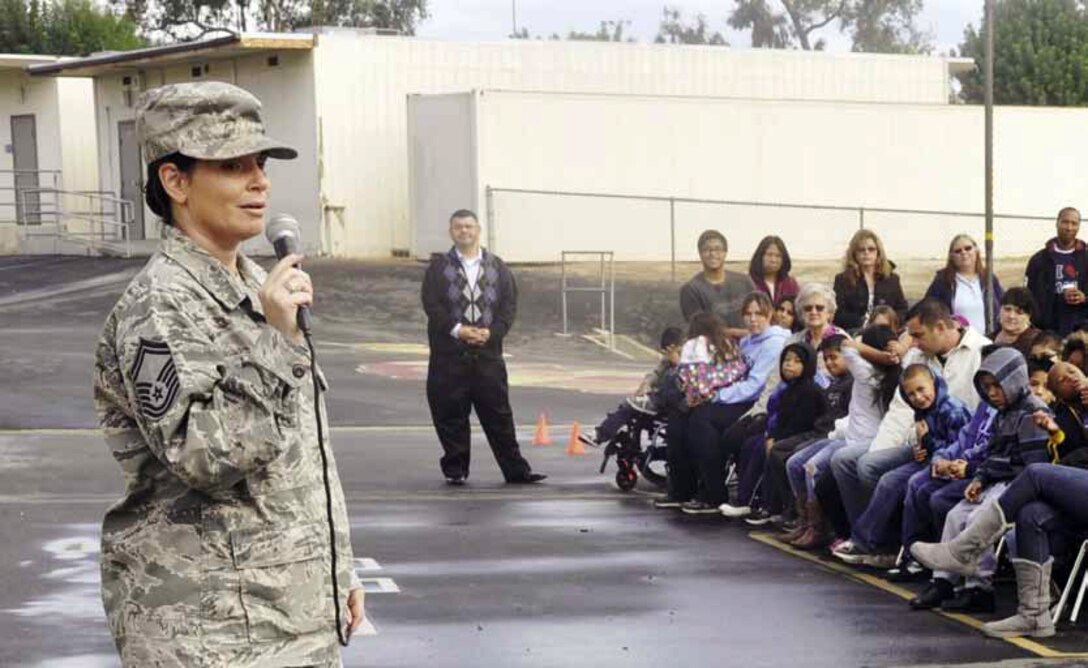 Senior Master Sgt. Tammy Haro , 752nd Medical Squadron spoke to more than 600 elementary students about her service to country, during a Veteran’s Day ceremony, held at the Moreno Valley Elementary school, Nov. 8. “I felt blessed and honored to have the opportunity to represent the Air Force Reserve for a Veteran’s Day  presentation at Moreno Valley Elementary school,” said Haro. “We shared the  meaning and importance of this special day and how everyone is affected in one way or another by a Veteran. Children from kindergarten through the 5th grade were able to recognize their family members, teachers and faculty as Veterans and for the sacrifices they’ve made. I have always been proud to follow in my father’s footsteps and serve my country. Sharing, with all those students, the accomplishments afforded to me by the military and the meaning of being a Veteran made me grateful to wear the uniform with so many others.” (U.S. Air Force photo by Darnell Gardner)
