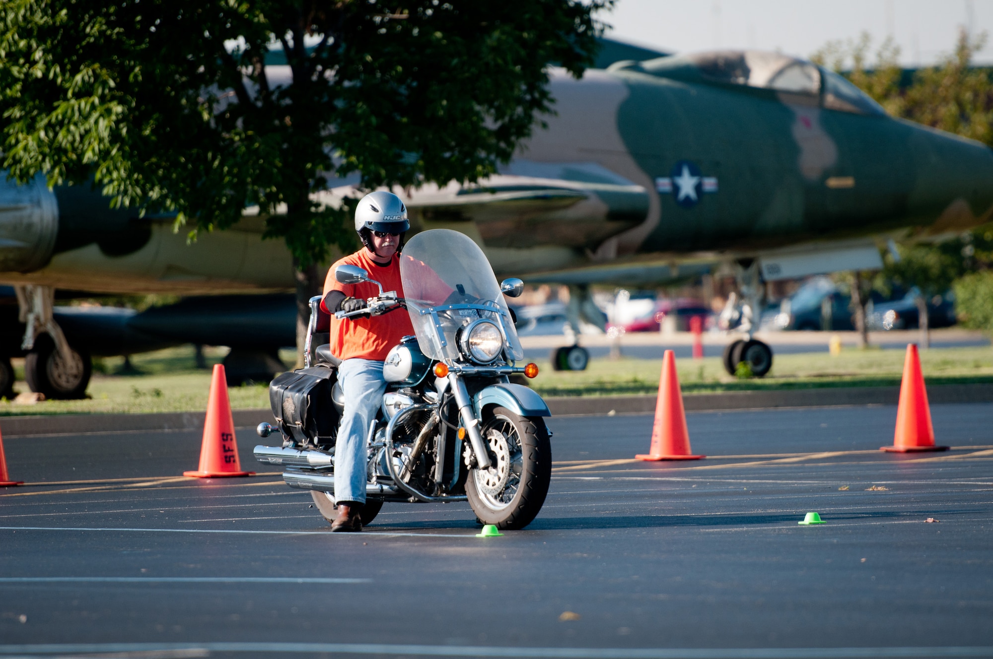Kentucky Air National Guard Master Sgt. Rollie Hodges, 123rd Civil Engineer Squadron Prime Beef manager, participates in a motorcycle safety train-the-trainer course at the Kentucky Air National Guard Base in Louisville, Ky., on Aug. 22, 2012. The course, part of the Motorcycle Safety Foundation's RiderCoach Program, was designed in part to train student instructors so they can go on to teach motorcycle safety to other service members. (Kentucky Air National Guard photo by Master Sgt. Phil Speck)