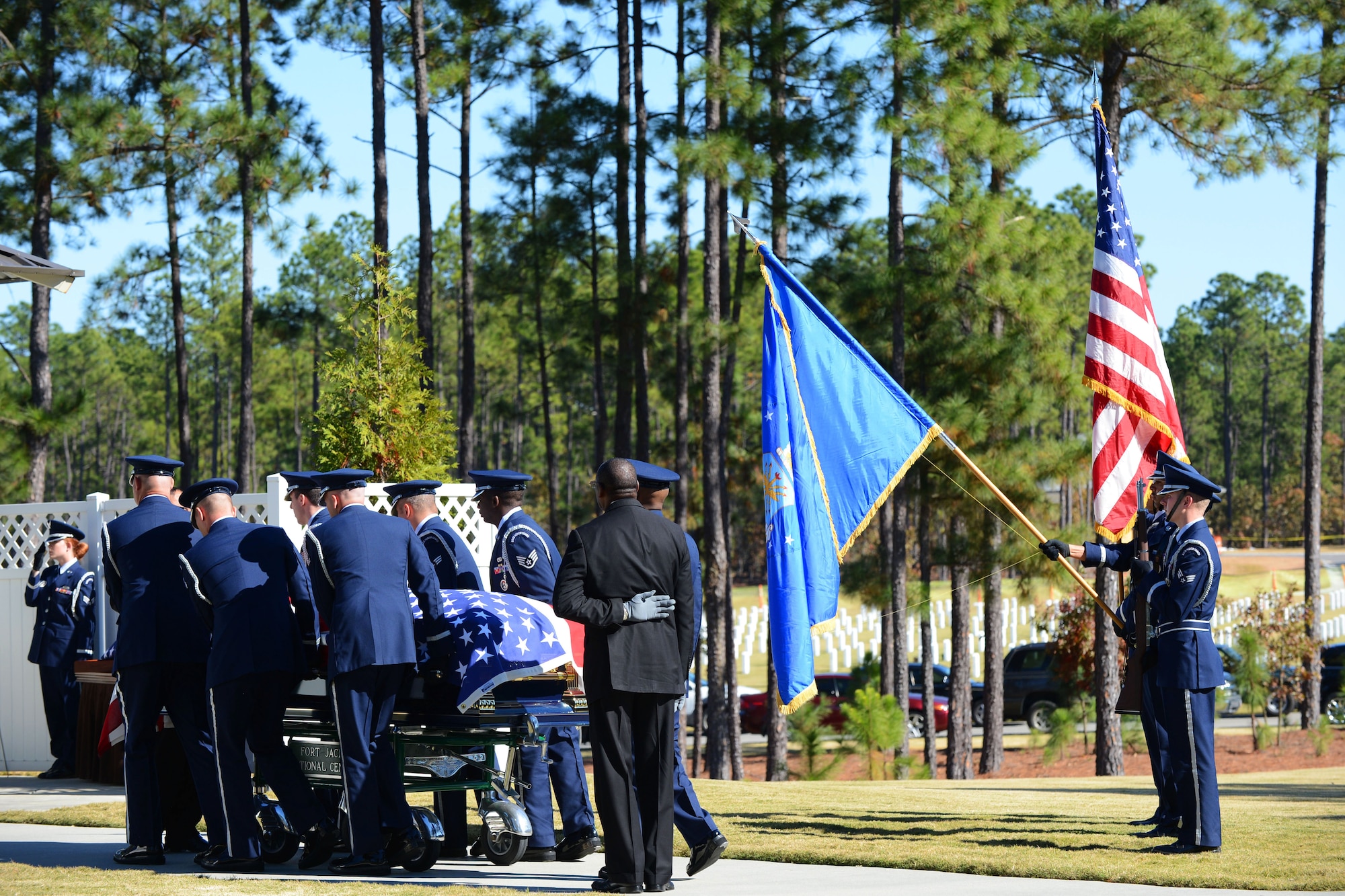 U.S. Air Force Airmen from the Shaw Air Force Base honor guard perform an active-duty funeral at Fort Jackson Army Post, S.C., Nov. 14, 2012. Every three months, Airmen at Shaw volunteer or are selected by their squadron to be a part of the base honor guard. Their honor guard service lasts up to a year with three month rotations. (U.S. Air Force photo by Airman Nicole Sikorski/Released)