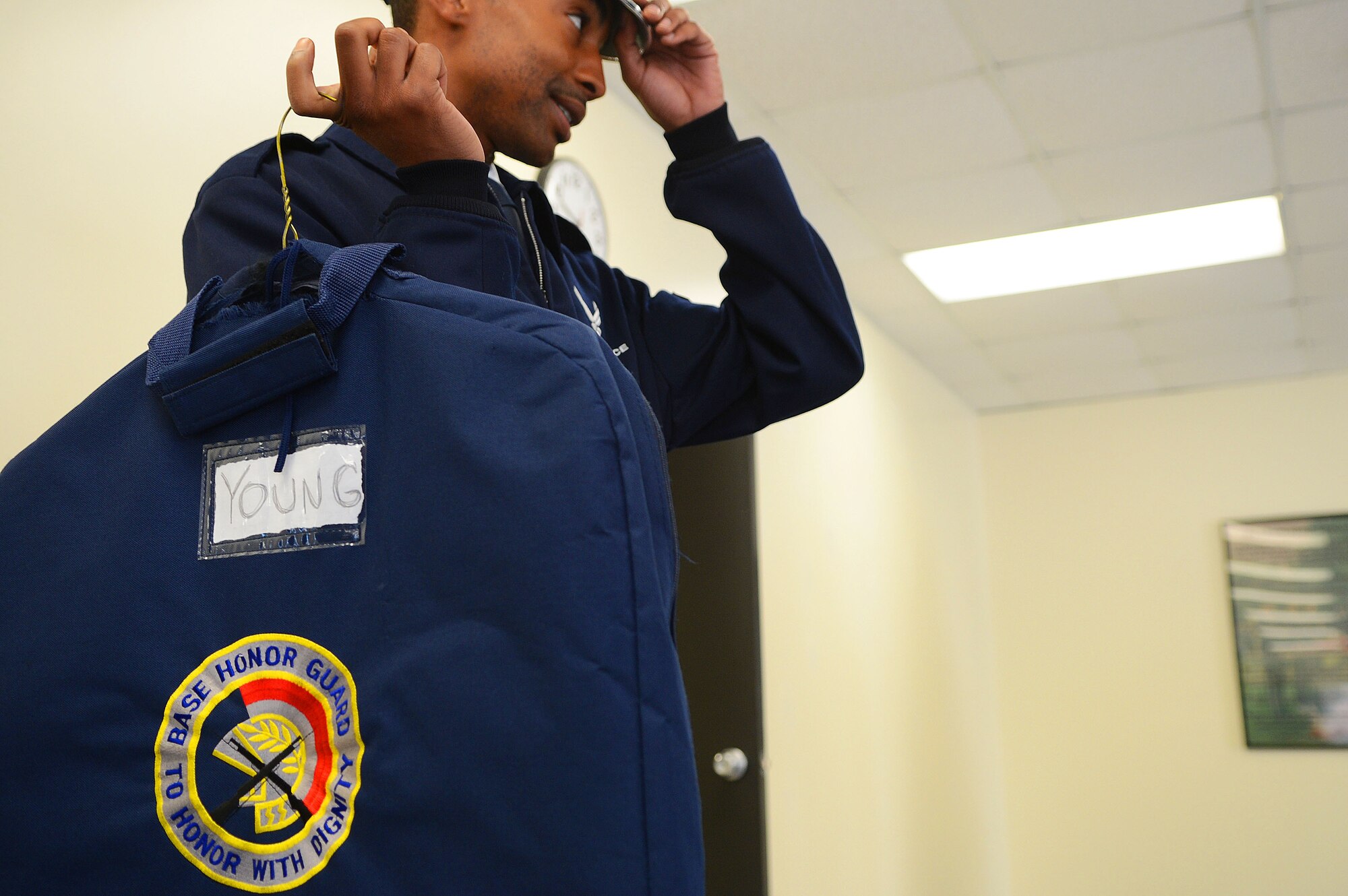 U.S. Air Force Airmen from the Shaw Air Force Base honor guard prepare for an active-duty funeral at Fort Jackson Army Post, S.C., Nov. 14, 2012. Every three months, Airmen at Shaw volunteer or are selected by their squadron to be a part of the base honor guard. Their honor guard service lasts up to a year with three month rotations. (U.S. Air Force photo by Airman Nicole Sikorski/Released)