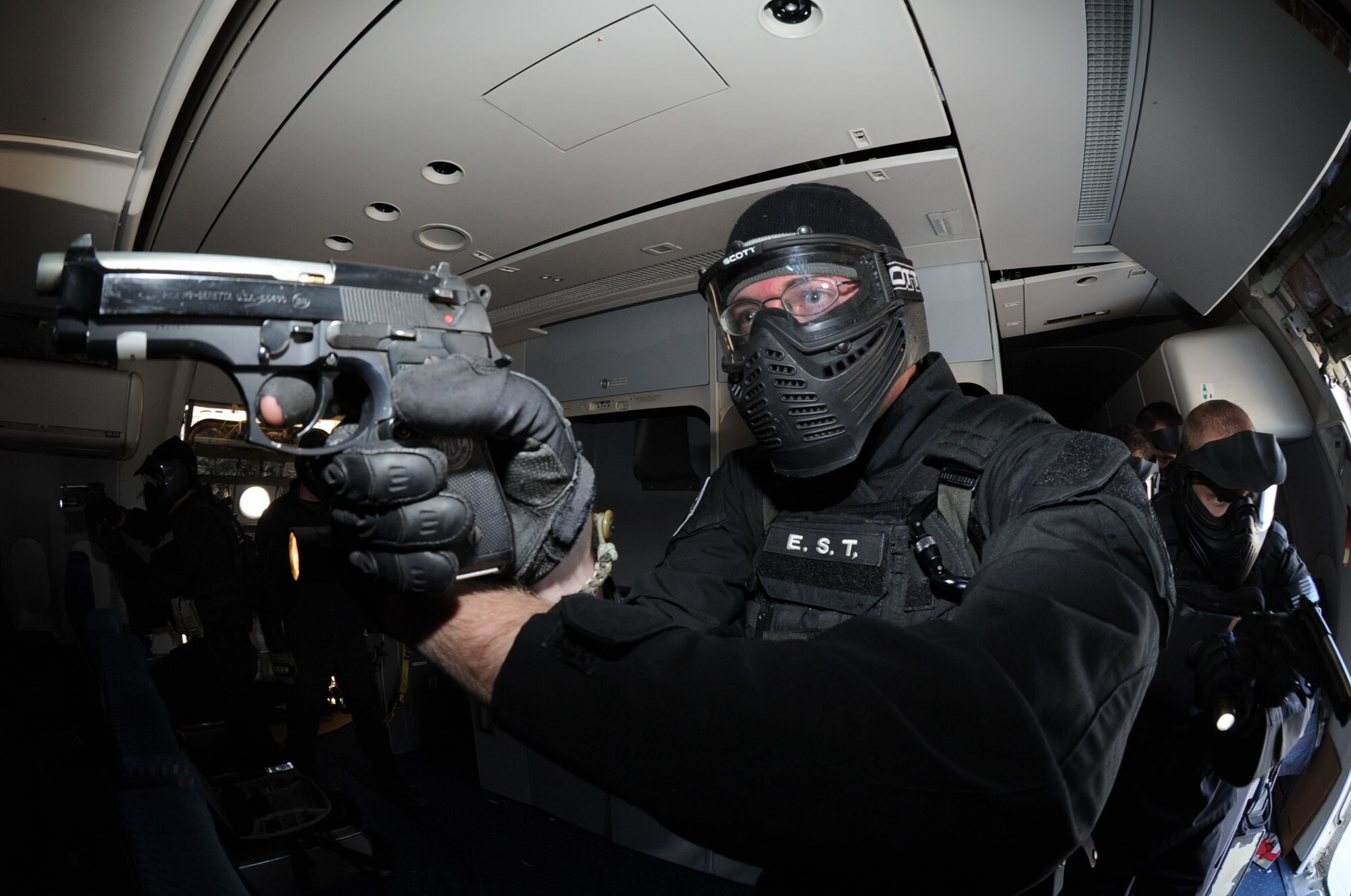 Staff Sgt. Greg Twigg, 11th Security Forces Squadron response force leader and Andrews Emergency Services Team member, controls his sector of fire during an anti-hijacking exercise Nov. 9, 2012, at the Joint Training Facility at Baltimore Washington International Airport, Md. The Andrews EST and Raven team conducted the training in a decommissioned Boeing 757 and used simunitions, or “dummy rounds” to create a more realistic atmosphere. (U.S. Air Force photo/ Senior Airman Bahja J. Jones) 