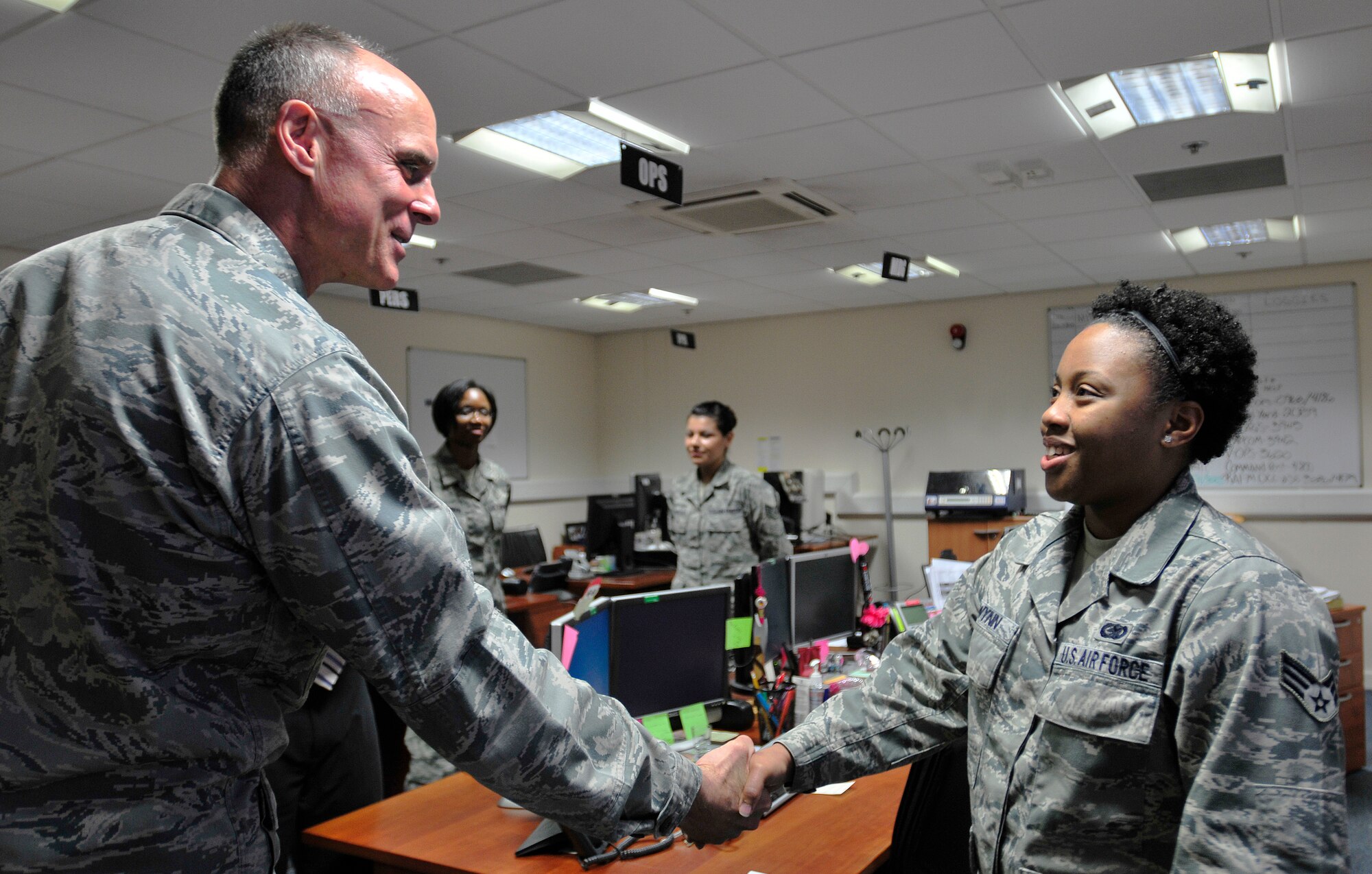 ROYAL AIR FORCE LAKENHEATH, England - Lt. Gen. Craig Franklin, 3rd Air Force commander, shakes hands with Senior Airman Kierra Wynn, 48th Logistics Readiness Squadron wing deployment manager, at the installation deployment readiness center, Nov. 14, 2012. Franklin visited RAF Lakenheath as part of his immersion since becoming the 3rd AF commander in March. He visited the hospital, IDRC, Hangars 6 and 7, fire department, 56th Rescue Squadron and other areas around the base to familiarize himself with the 48th Fighter Wing members and mission. (U.S. Air Force photo by Senior Airman Tiffany M. Grigg) 