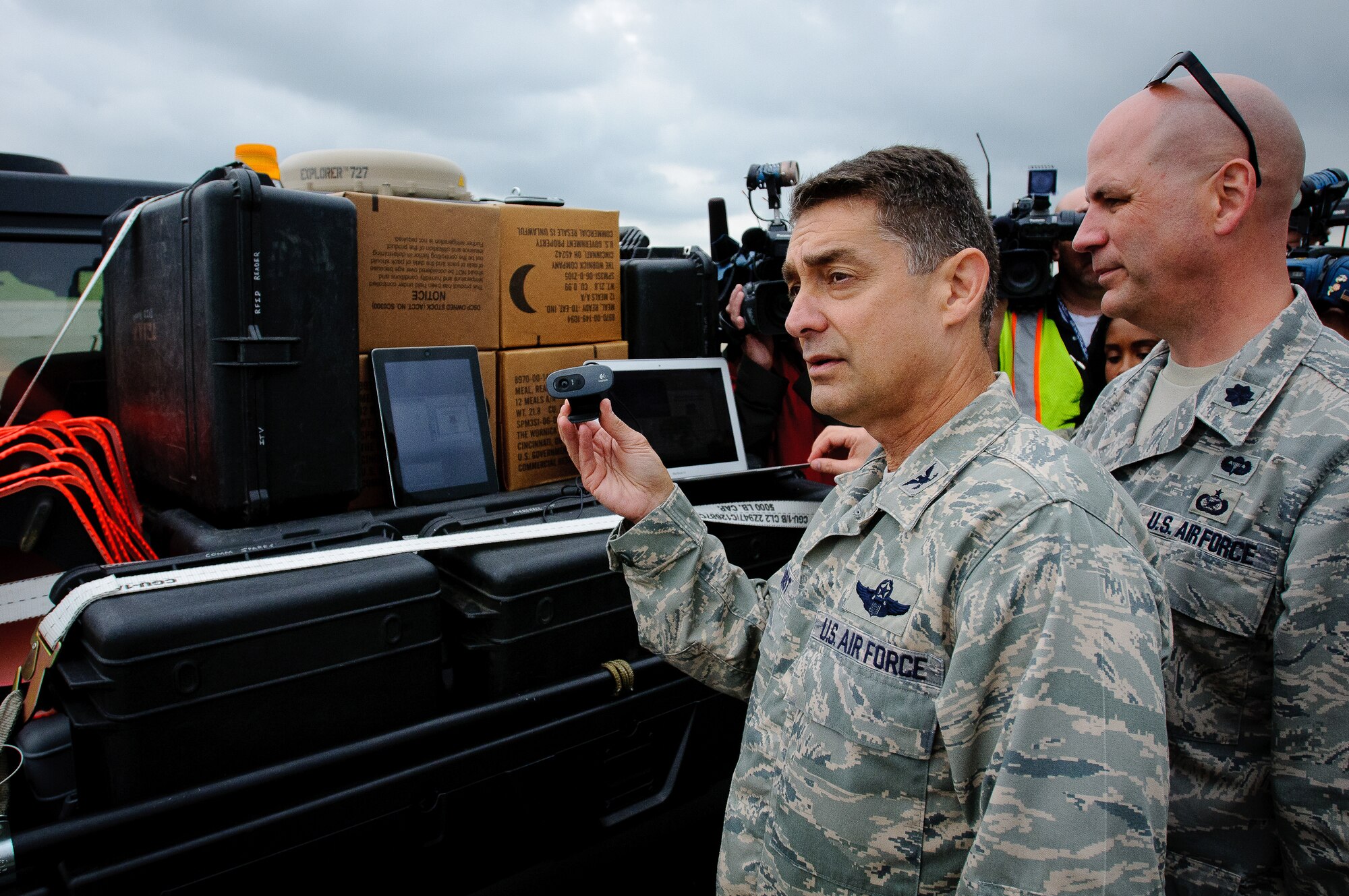 Col. Warren Hurst, commander of the Kentucky Air National Guard's 123rd Contingency Response Group, provides simulated civilian and military leadership with a live video feed of ground conditions at Campbell Army Airfield during an earthquake-response exercise May 14, 2012, at Fort Campbell, Ky. The event marked the first time that disaster-response forces have provided live video to national leaders within hours of a catastrophic event. (U.S. Air Force photo by Senior Airman Maxwell Rechel)