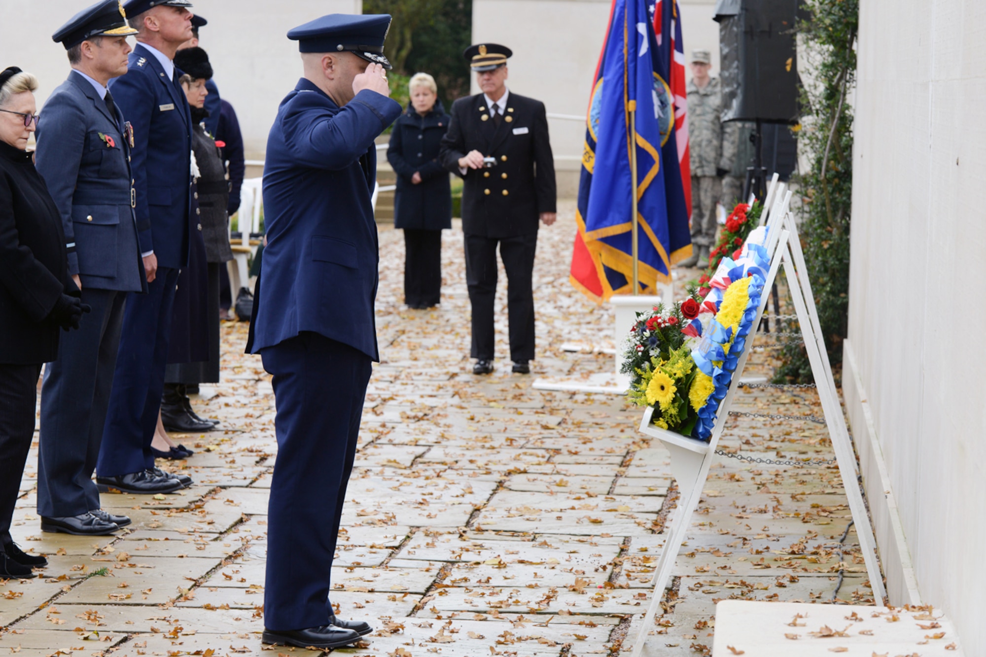 CAMBRIDGE, United Kingdom – Col. Brian May, 501st Combat Support Wing vice commander, salutes after placing a wreath at the Tablets of the Missing during the Veteran’s Day ceremony at Cambridge American Cemetery Nov. 12. Nearly 50 wreathes were laid during the ceremony to honor and remember veterans from the United States and the United Kingdom. (U.S. Air Force photo by Staff Sgt. Brian Stives)