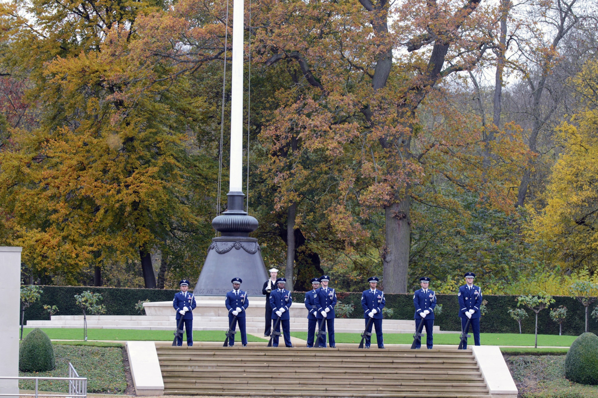 CAMBRIDGE, United Kingdom – The 423rd Air Base Group Honor Guard stand ready to fire three volleys of seven guns during the Veteran’s Day ceremony at Cambridge American Cemetery Nov. 12. Cambridge American Cemetery is the only World War II American cemetery in England. (U.S. Air Force photo by Staff Sgt. Brian Stives)