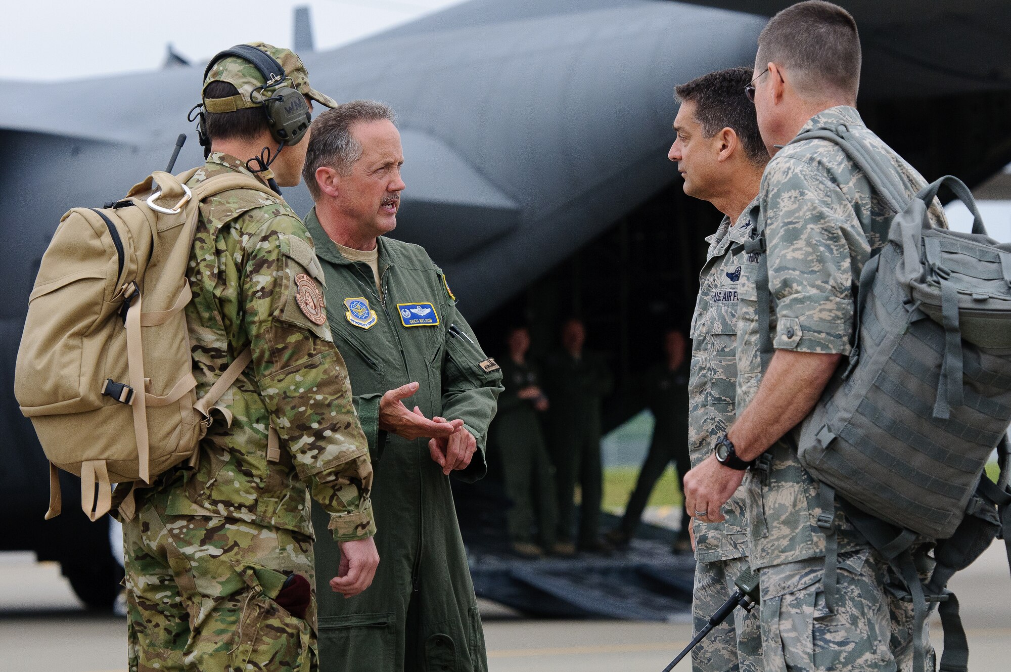 Col. Greg Nelson (second from left), commander of the 123rd Airlift Wing, consults with members of the unit's Initial Response Hub team at Fort Campbell, Ky., during an earthquake-response exercise May 14, 2012. About 20 Airmen from the 123rd Contingency Response Group and 123rd Special Tactics Squadron deployed to Fort Campbell to demonstrate their preparedness for an initial response after a natural disaster. The Kentucky Air Guard's Initial Response Hub team is the first of its kind in the nation. No other unit in the U.S. military has the same breadth of capabilities housed in one unit, with the C-130 aircraft to permit immediate response. (U.S. Air Force photo by Senior Airman Maxwell Rechel)