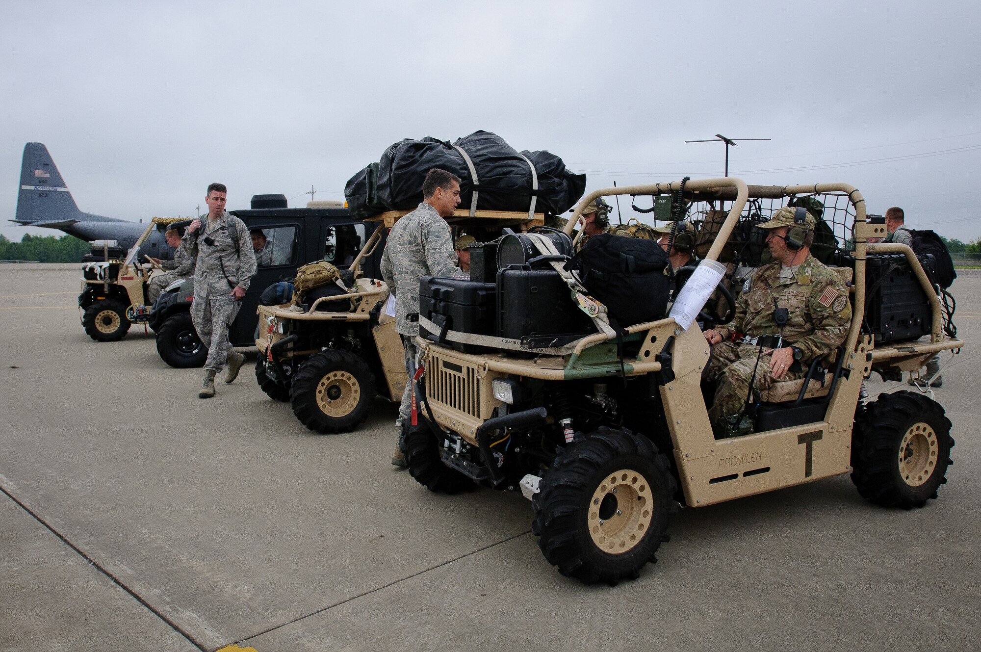 Members of the Kentucky Air National Guard use all-terrain vehicles to conduct an airfield assessment at Fort Campbell, Ky., during an earthquake-response exercise May 14, 2012. About 20 Airmen examined all aspects of Campbell Army Airfield for simulated earthquake damage, determined the kinds of airlift operations the facility could support and opened the ramp for incoming relief and aeromedical evacuation flights within five hours of being called to duty.  (U.S. Air Force photo by Senior Airman Maxwell Rechel)