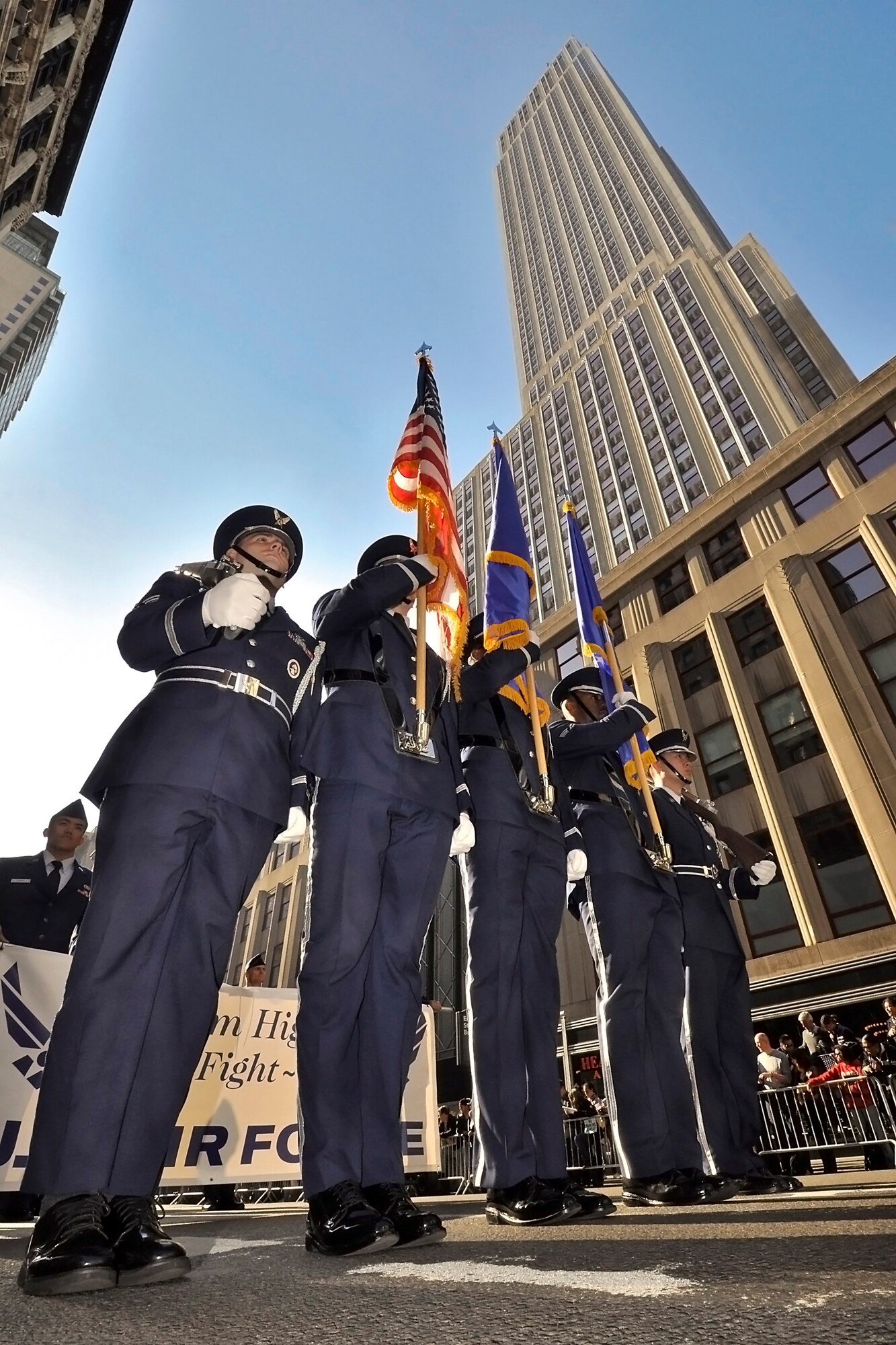 An Air Force honor guard team made up of Air Force Reserve, Guard and active-duty Airmen led more than 130 fellow Airmen from Joint Base McGuire-Dix-Lakehurst, N.J., past the Empire State Building during the New York City Veterans Day Parade Nov. 11, 2012. The Airmen were not the only service members from the base to demonstrate their appreciation. Marines from Marine Aircraft Group 49 also showed their support by attending and marching in the parade. (U.S. Air Force photo by Shawn Jones/Released)