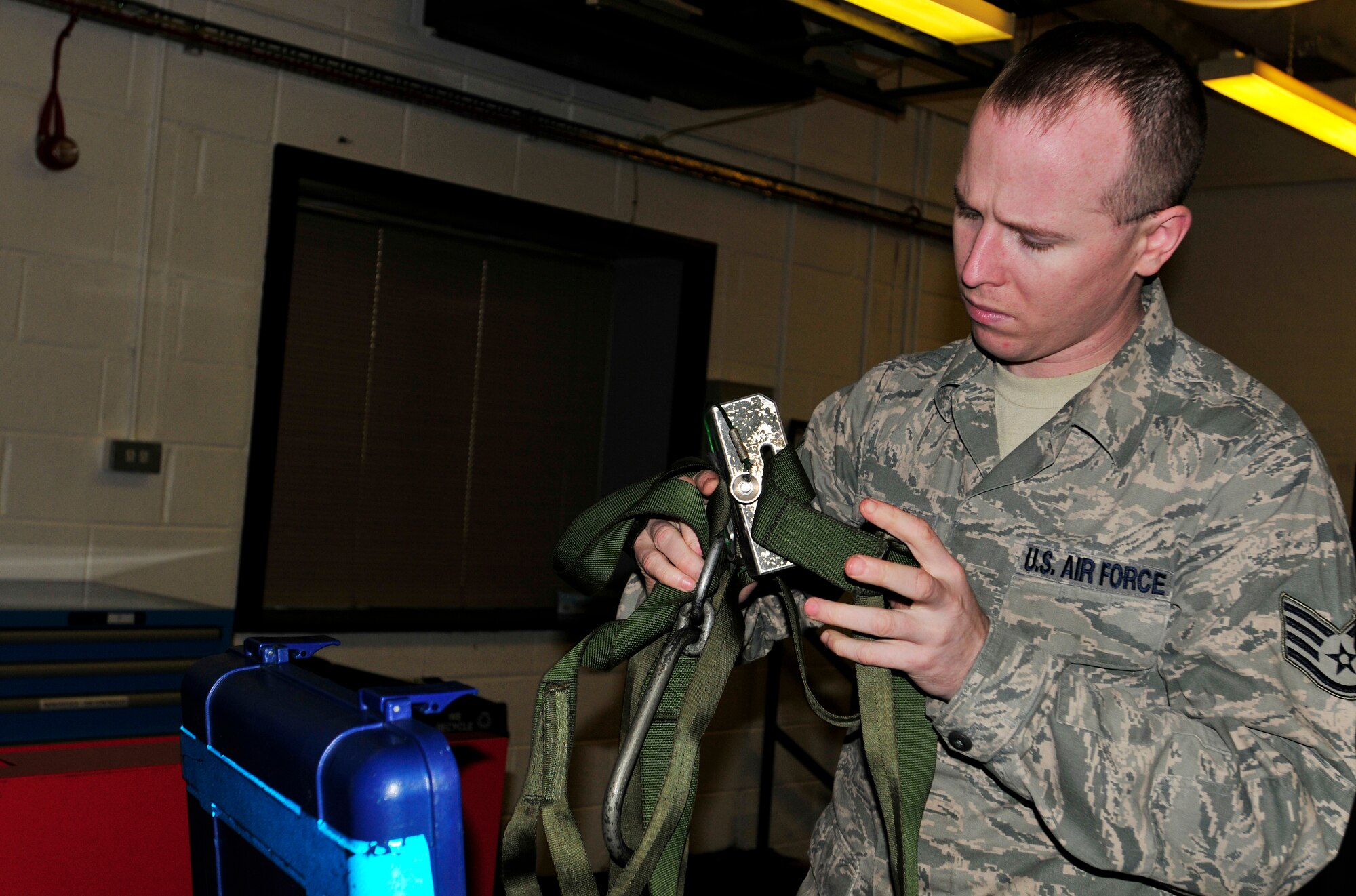 ROYAL AIR FORCE LAKENHEATH, England - Staff Sgt. Robert Kelsey, 48th Equipment Maintenance Squadron support section journeyman, inspects a canopy sling Nov. 14, 2012. Kelsey was nominated for a Liberty Spotlight because he displays the core value of "Excellence in All We Do." (U.S. Air Force photo by Senior Airman Tiffany M. Grigg) 