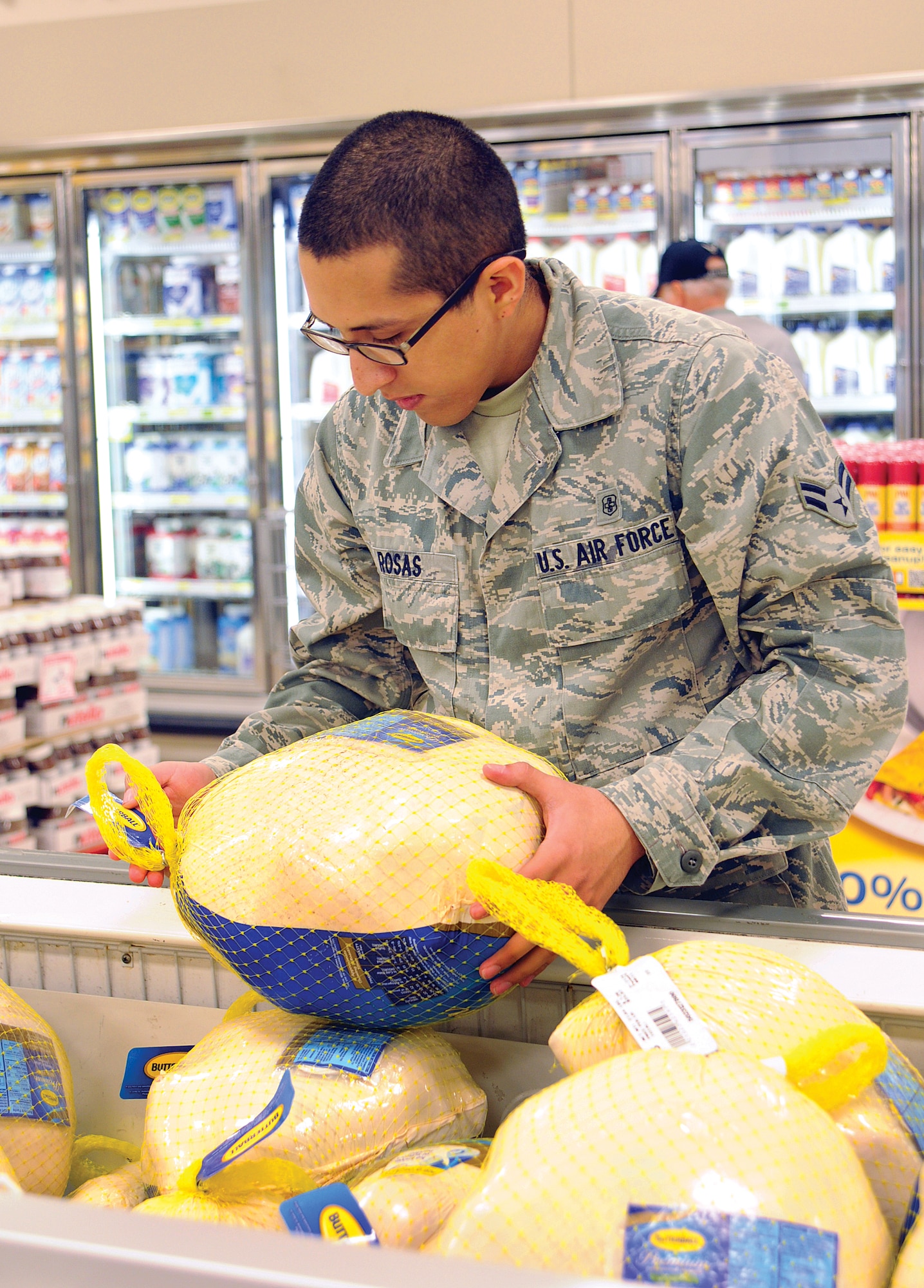 Before aromas of a traditional Thanksgiving feast fill the air, Public Health Flight personnel are already checking Base Commissary items during an Oct. 25 routine inspection of the store.  Airman 1st Class Manolo Rosas checks staples such as turkeys, canned pumpkin for pies and the variety of veggies and stuffings to ensure package integrity and freshness are good, as is typically true of the base commissary groceries. Following the Public Health technician’s example in your family feast planning and cooking will help you have a happy, home-cooked Thanksgiving.