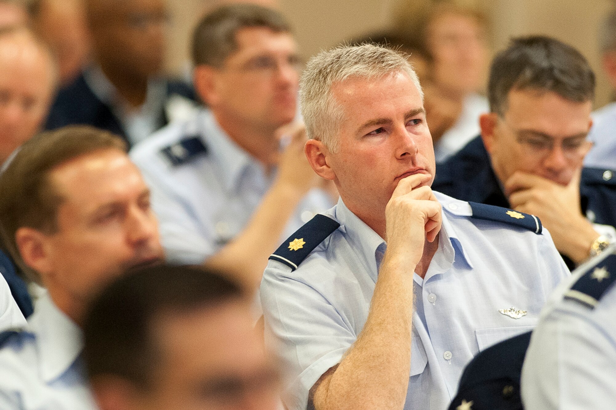U.S. Air Force Maj. William Leahy, listens to Lt. Gen. Harry M. Wyatt III, the director of the Air National Guard, address National Guard senior leaders Nov. 14, 2012, during the ANG Senior Leadership Conference at the National Conference Center in Leesburg, Va. The ANG SLC offered a single forum for senior leaders and unit commanders to exchange ideas and provide field input on critical issues affecting the future of the ANG. (National Guard photo by Master Sgt. Marvin Preston/RELEASED)