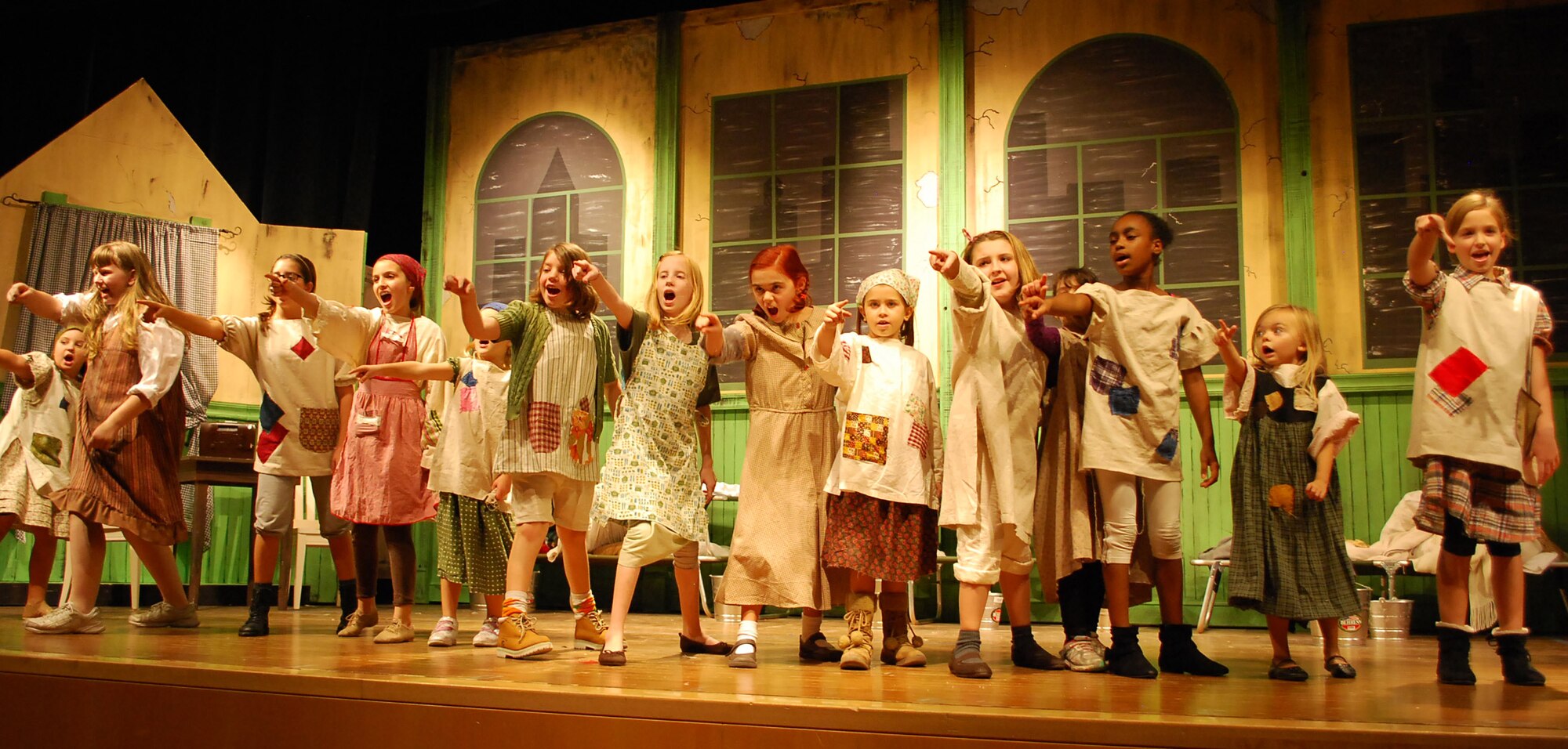 Cast members of ‘Annie’ rehearse for the upcoming stage performance Nov. 9 at Aviano Air Base, Italy. The musical is one of three plays to be held during the 2012-2013 school year. (Courtesy photo)


