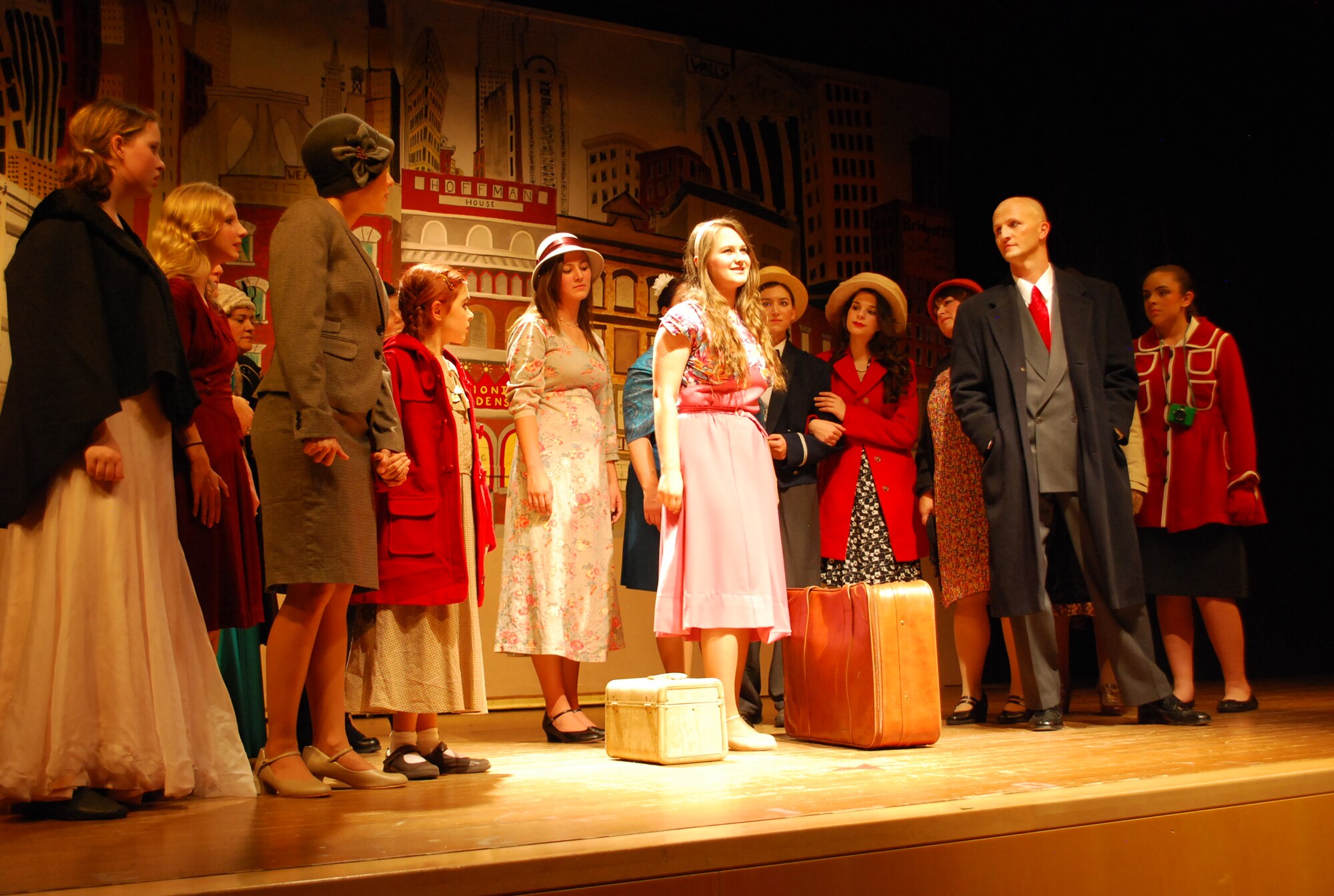 Cast members of ‘Annie’ rehearse for the upcoming stage performance Nov. 9 at Aviano Air Base, Italy.The musical is about a young orphan who tries to find a family to adopt her. ‘Annie’ is one of three plays to be held during the 2012-2013 school year. (Courtesy photo)

