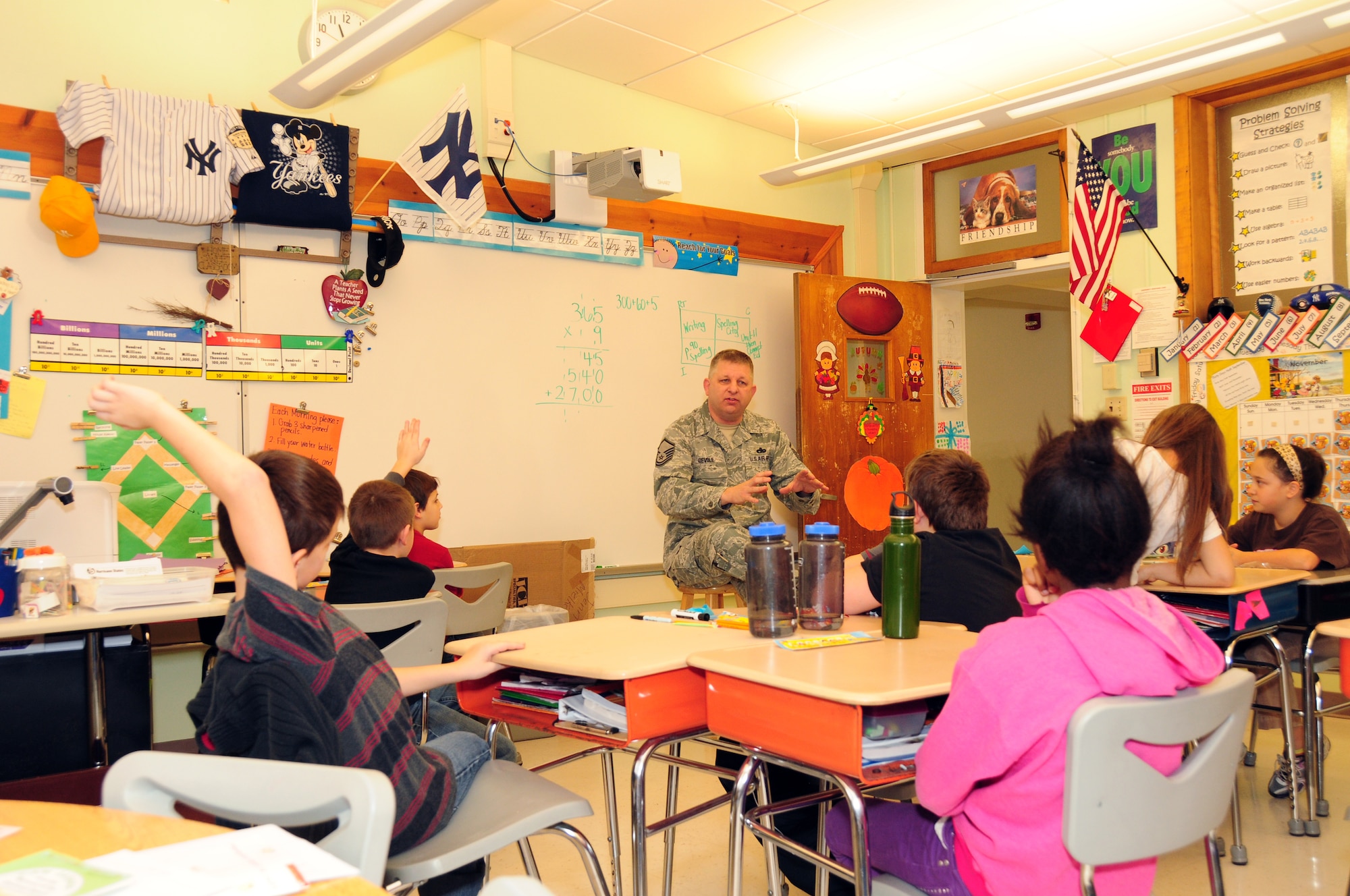 Master Sgt. Kenneth Devole, 107th Airlift Wing Vehicle Operations Supervisor, New York Air National Guard, was invited to visit a third-grade class at Colonial Village Elementary School, Town of Lewiston,  N.Y. Nov. 14, 2012. Sgt. Devole talked about his past deployments, his career goals and the importance of education.  (Air National Guard Photo/Senior Master Sgt. Ray Lloyd)