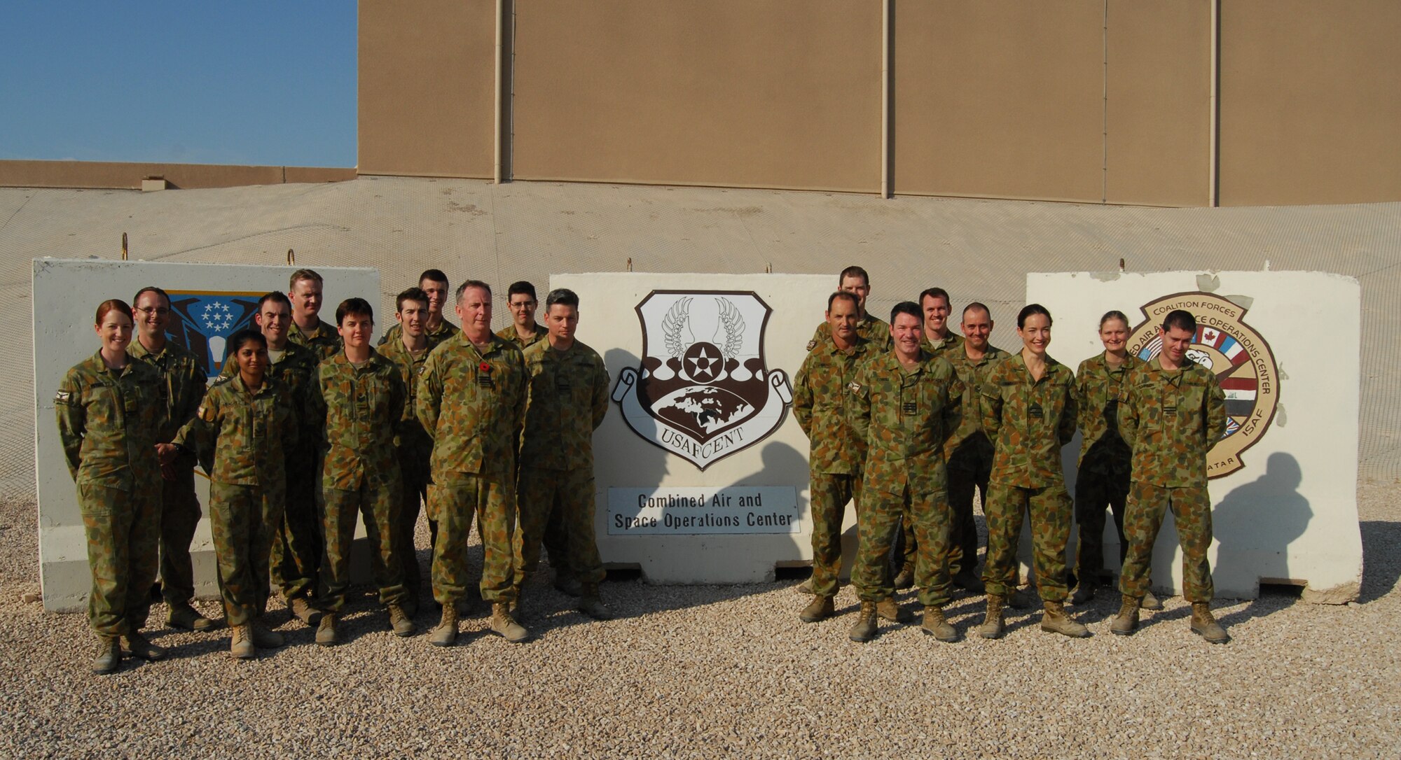 SOUTHWEST ASIA - Members of the Royal Australian Air Force are assigned to the Combat Air Operations Center, a tenant unit of the 379th Air Expeditionary Wing, to provide support capabilities to enable air efforts in support of coalition troops downrange. (U.S Air Force photo/Michael Andriacco)