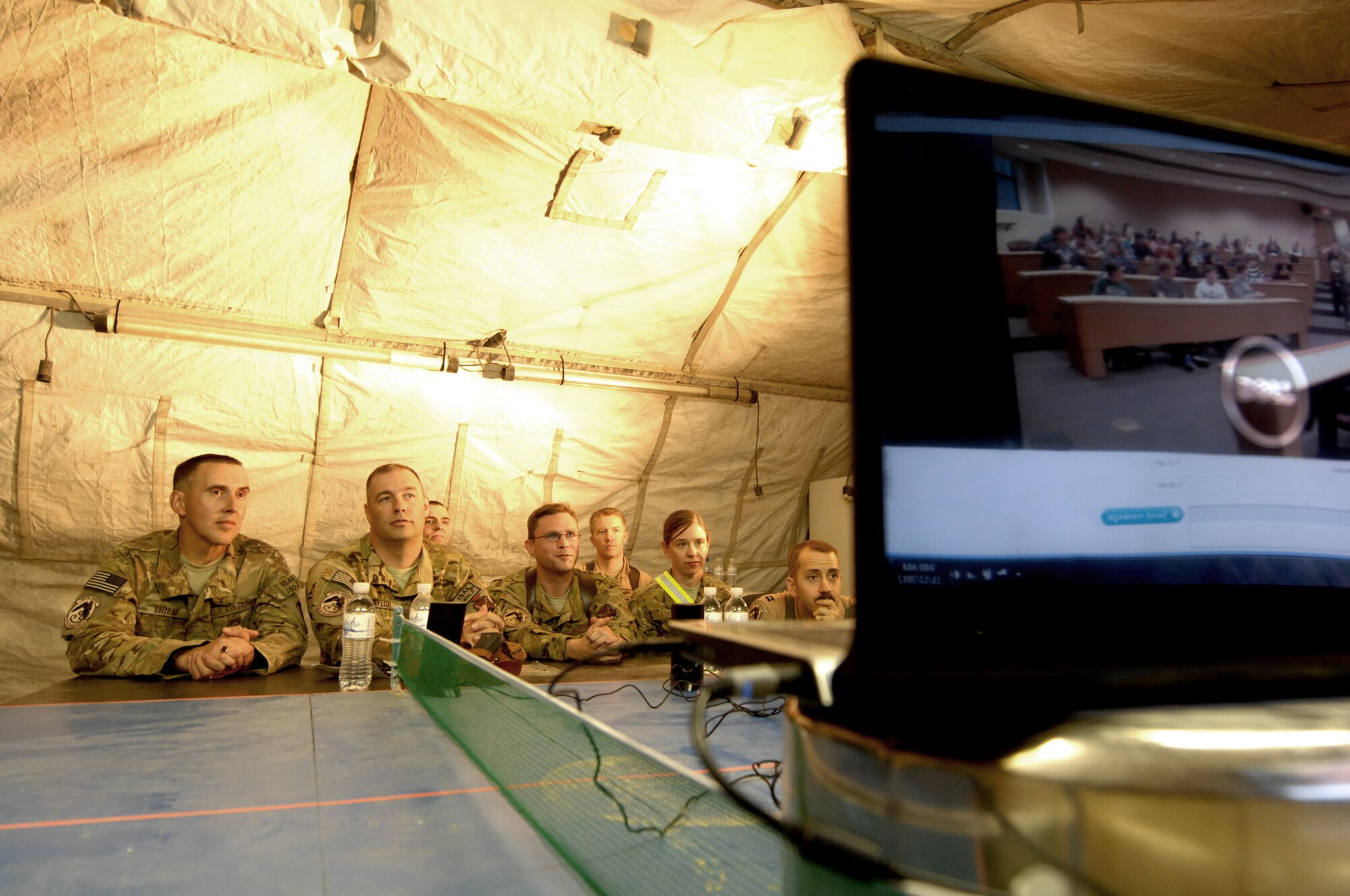U.S. Air Force Airmen, from left, Lt. Col. Terry Thiem, 361st Expeditionary Reconnaissance Squadron; Senior Master Sgt. Jeffrey Taylor, 361st ERS superintendent; 1st Lt. Scott Ball, 361st ERS; Master Sgt. Jody Kouma, 451st Expeditionary Operations Group first sergeant; Capt. Pedro Esquivel , 361st ERS; (back from left) Capt. Otto Gerdeman, 361st ERS; and Capt. David Hidalgo, 361st ERS talk via Skype here with students at Mason High School in Mason, Ohio. Nov. 12. (U.S. Air Force photo/Master Sgt. Russell Martin)