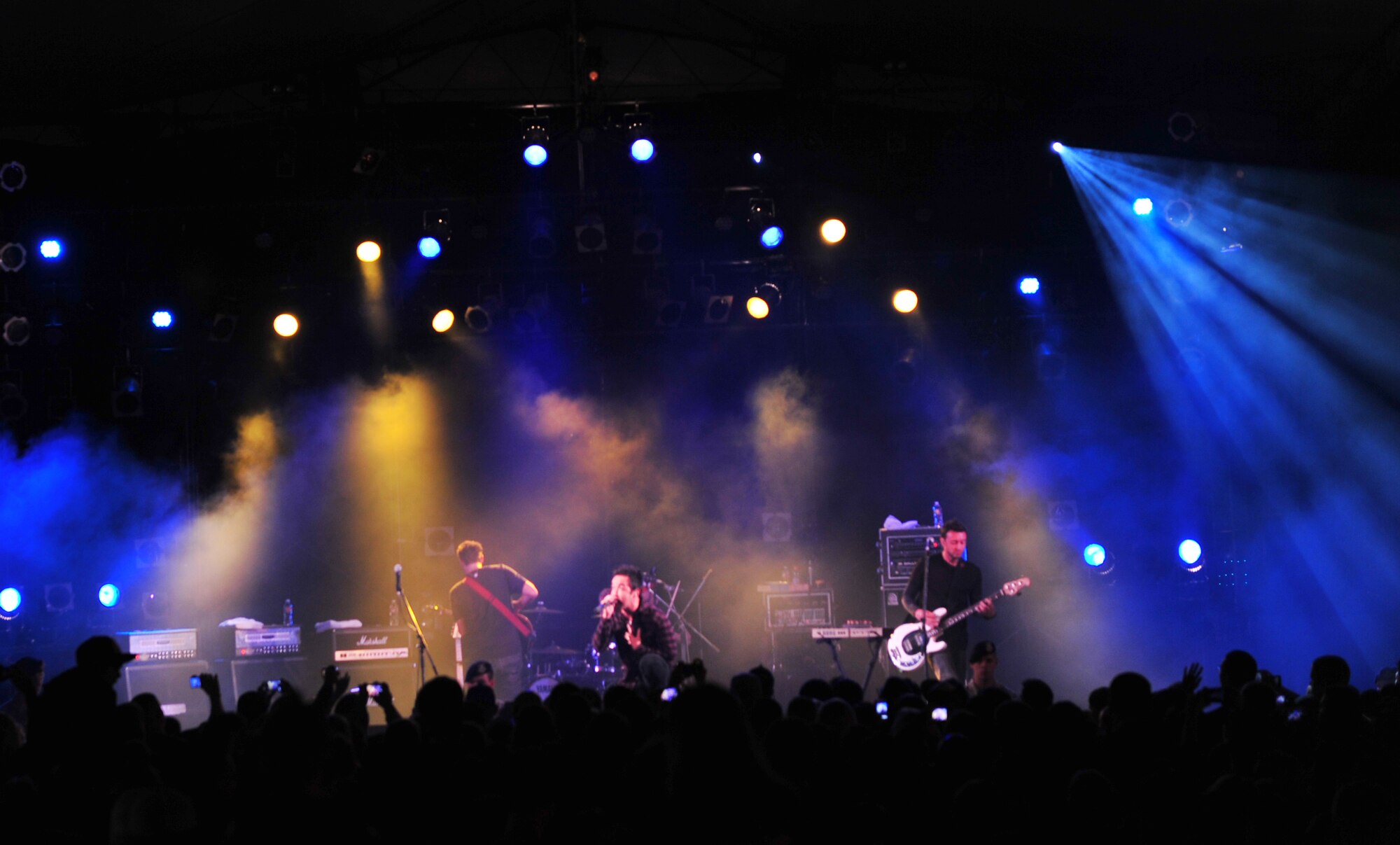 Hoobastank, an American rock band, performs for service members and their families from across Okinawa on Kadena Air Base, Japan, Nov. 15, 2012. Thousands of service members and their families came out to the Emery Bowling Center for the free concert put on by the 18th Force Support Squadron. (U.S. Air Force photo/Staff Sgt. Sara Csurilla)