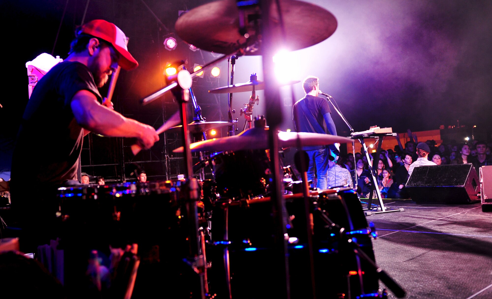 Chris Hesse, drummer for Hoobastank, an American rock band, performs for service members and their families from across Okinawa on Kadena Air Base, Japan, Nov. 15, 2012. Thousands of service members and their families came out to the Emery Bowling Center for the free concert put on by the 18th Force Support Squadron. (U.S. Air Force photo/Staff Sgt. Sara Csurilla)
