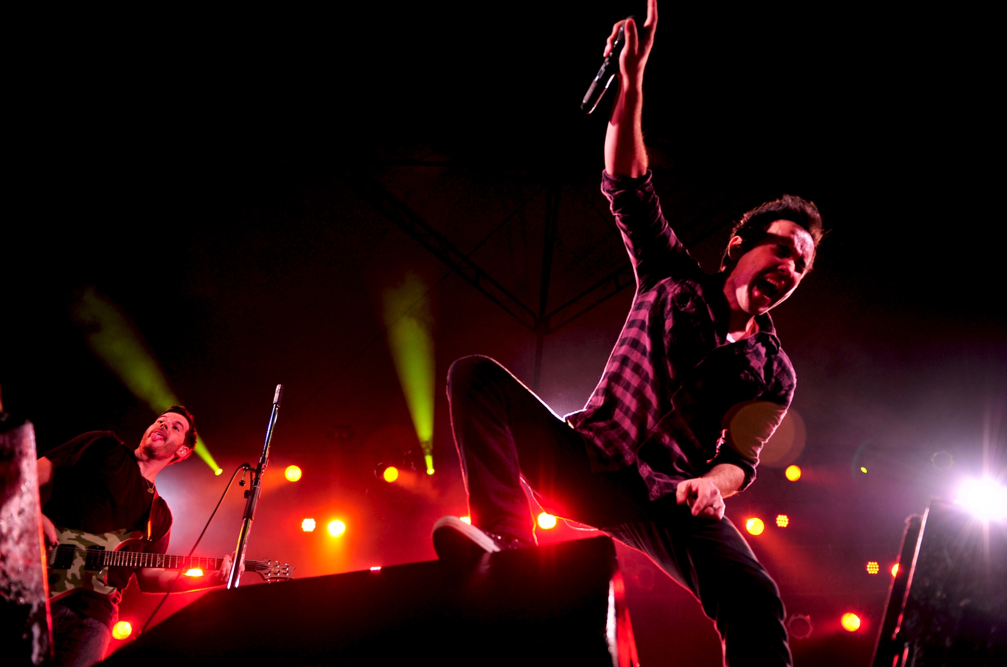 Doug Robb, the lead singer for Hoobastank, an American rock band, performs for service members and their families from across Okinawa on Kadena Air Base, Japan, Nov. 15, 2012. Thousands of service members and their families came out to the Emery Bowling Center for the free concert put on by the 18th Force Support Squadron. (U.S. Air Force photo/Staff Sgt. Sara Csurilla)