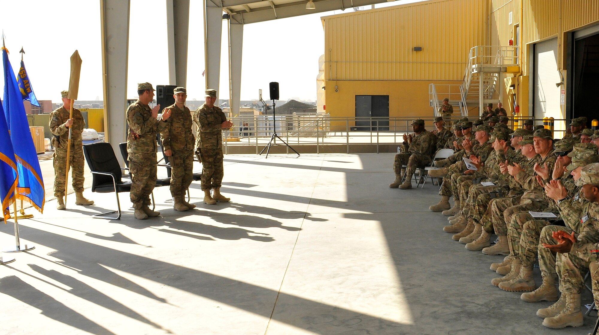 Members of the 455th Air Expeditionary Wing welcome the first 455th Expeditionary Security Forces Group commander, Col. Brian Greenroad,  Bagram Airfield, Afghanistan, Nov. 14, 2012.  Under Greenroad’s command, the 455th ESFG will be responsible for the security and protection of more than 35,000 base personnel and their equipment.  (U.S. Air Force photo/Senior Airman Chris Willis)