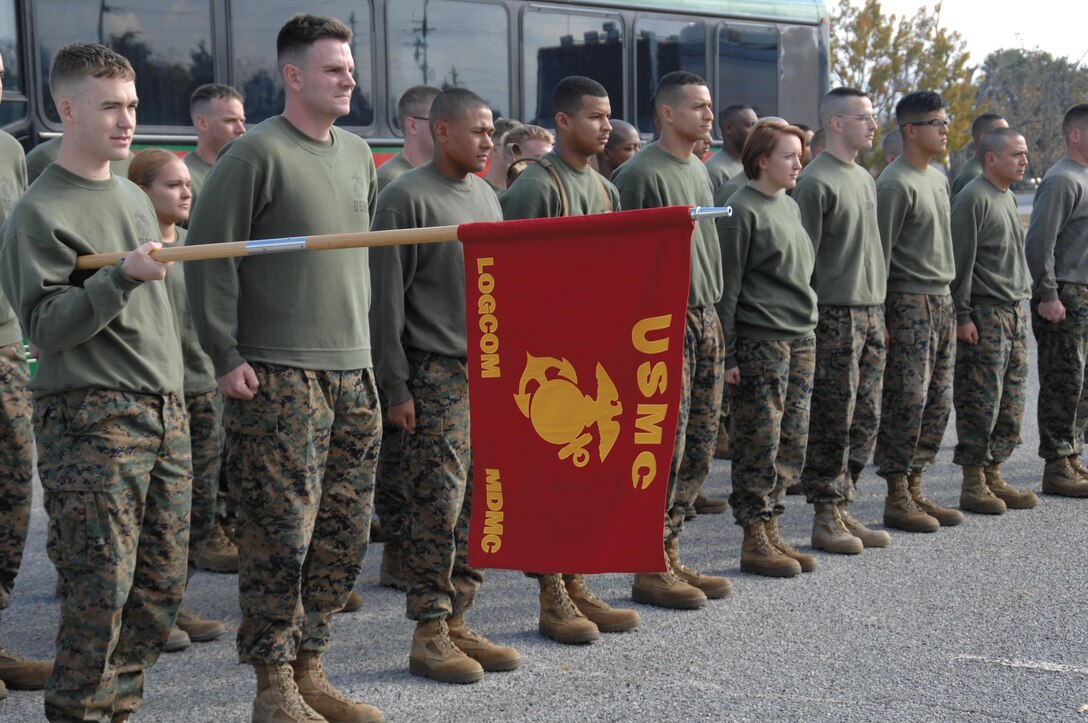 Marines stand in formation before running in the 8th annual Operation One Voice Run, Nov. 7. They ran through the streets of Albany, Ga., singing cadences.
