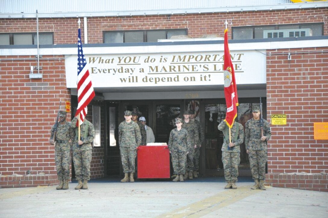 Marine Depot Maintenance Command Marines participate in a cake-cutting ceremony, Nov. 7, in front of the command’s headquarters. Marines, Civilian-Marines and contractors attended the observation to honor the 237th birthday of the Marine Corps.
