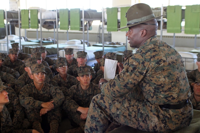 Staff Sgt. Antoine Griffith, senior drill instructor, Platoon 1031, Company B, gives some pointers to his recruits prior to a series commander inspection aboard Marine Corps Recruit Depot San Diego, Nov. 1. Griffith said he tries to teach his recruits how to be proficient Marines.

