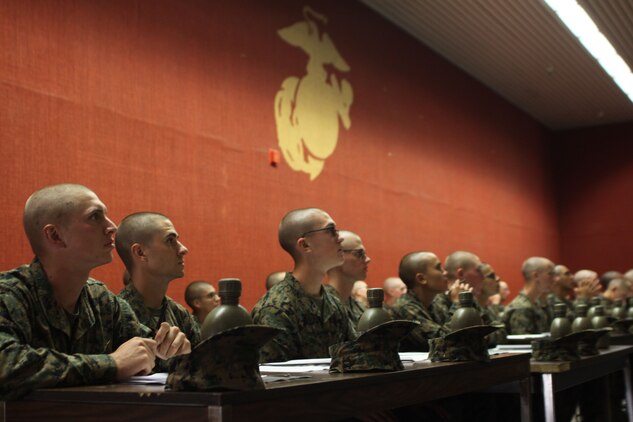 Recruits of Company F, 2nd Recruit Training Battalion, are told how to conduct themselves while on their 10 days of leave aboard Marine Corps Recruit Depot San Diego, Nov. 6. Recruits were also explained how to find their recruiting station during their assigned 28 days of recruitor assistance following their leave. 