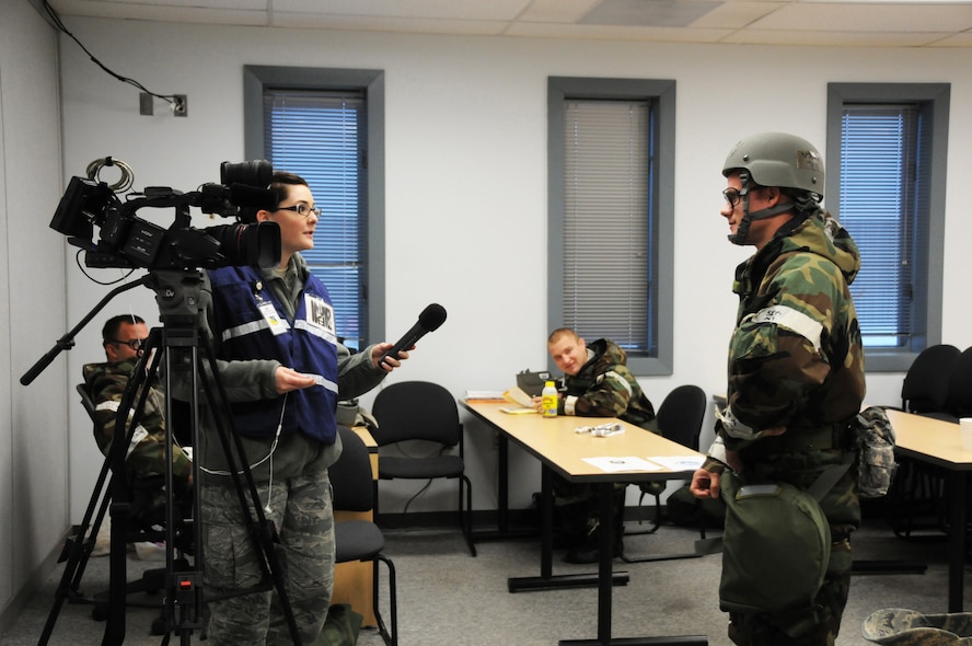 Senior Airman Kaitlyn Cook, 193rd Special Operations Wing Public Affairs, interviews Senior Airman Matthew Pierce, 193rd SOW Air Space Propulsion Journeyman, about his expectations and experience during his first Operational Readiness Inspection, Middletown, Pa. on Nov. 03, 2012.

The inspection included four phases that were spread out during the course of nine months. The 193rd SOW scored an overall EXCELLENT on the ORI. (U.S. Air Force photo by Tech. Sgt. Mariko Bender/Released)