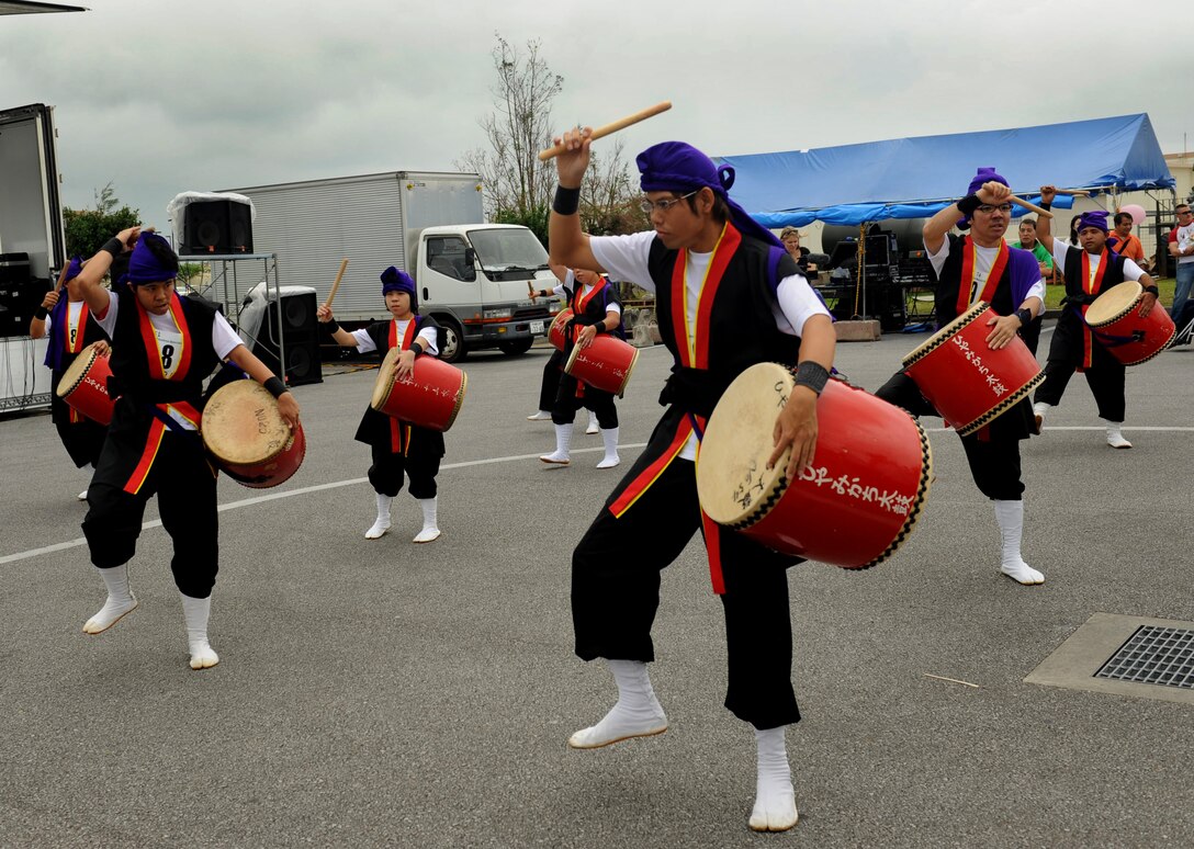 Daiko-drummers perform at the Risner Fitness Center during Kadena Special Olympics on Kadena Air Base, Japan, Nov. 17, 2012. Thousands of spectators and regional leaders from Japan and the United States came out to show support for more than 1,500 artists and athletes participating in the 13th Annual KSO Games and Art Show. The event is sponsored by the 18th Wing and the Friends of Kadena Special Olympics in partnership with the Okinawa Prefectural Government, Okinawa City, Kadena Town, Chatan Town and all U.S. military services on island. (U.S. Air Force photo/Airman 1st Class Hailey Davis)