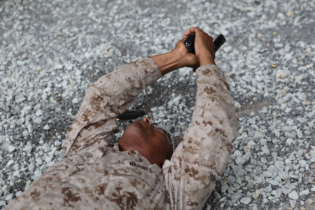 Marine reservists with Special-Purpose Marine Air Ground Task Force 12 practice marksmanship techniques Oct. 26. The Marines  spent two weeks aboard Marine Corps Base Camp Lejeune learning a new set of skills with Marine Corps Police Academy East.