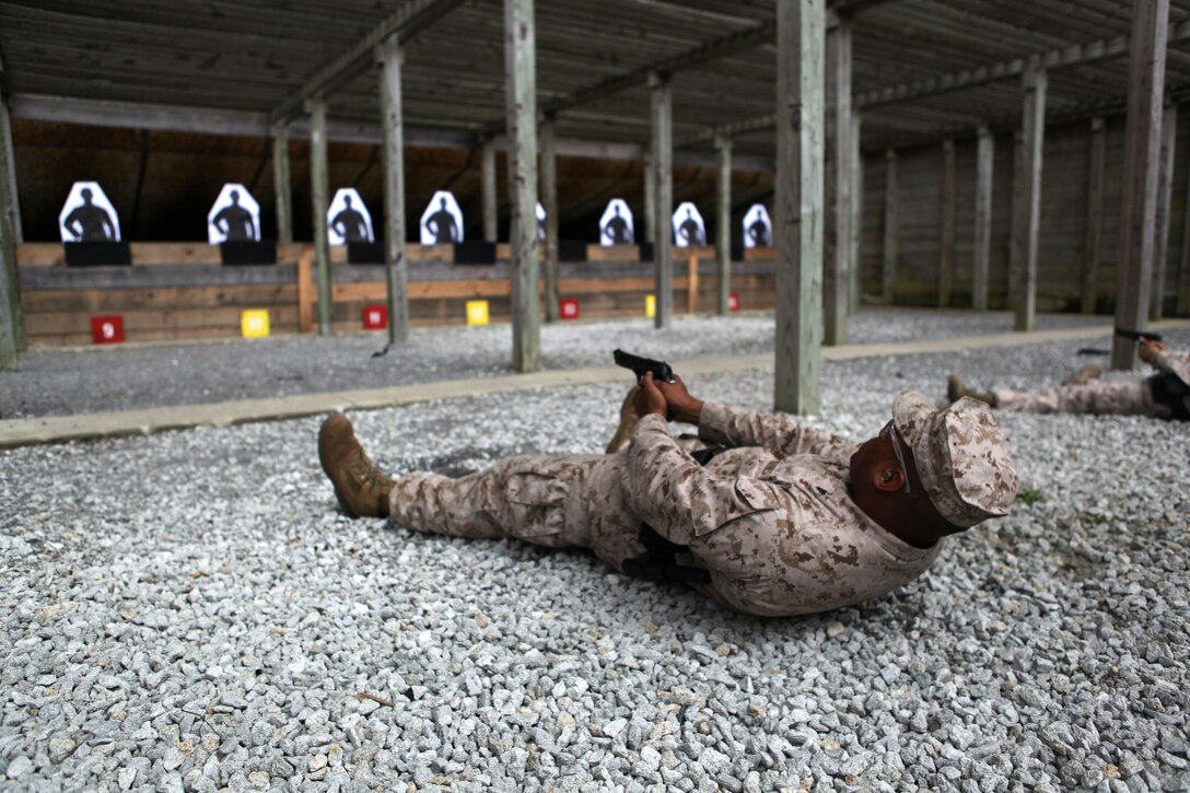 Marine reservists with Special-Purpose Marine Air Ground Task Force 12 practice marksmanship techniques Oct. 26. The Marines  spent two weeks aboard Marine Corps Base Camp Lejeune learning a new set of skills with Marine Corps Police Academy East.