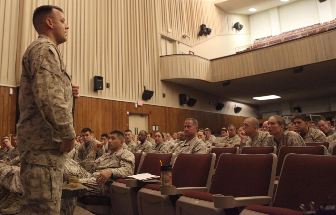 Sgt Maj. Michael J. Rowan, Marine Corps Installation East-Marine Corps Base Camp Lejeune's Headquarters and Support Battalion's sergeant major speaks to his Marines during the Sexual Assault Prevention and Response all-hands training at the Camp Lejeune Base Theater Oct. 16. The presentation detailed what entails sexual assault, it's impact along with other information on the subject.  