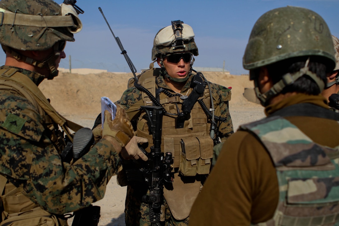 Sergeant Cordero Gonzalez, center, squad leader, Lima Company, 3rd ...