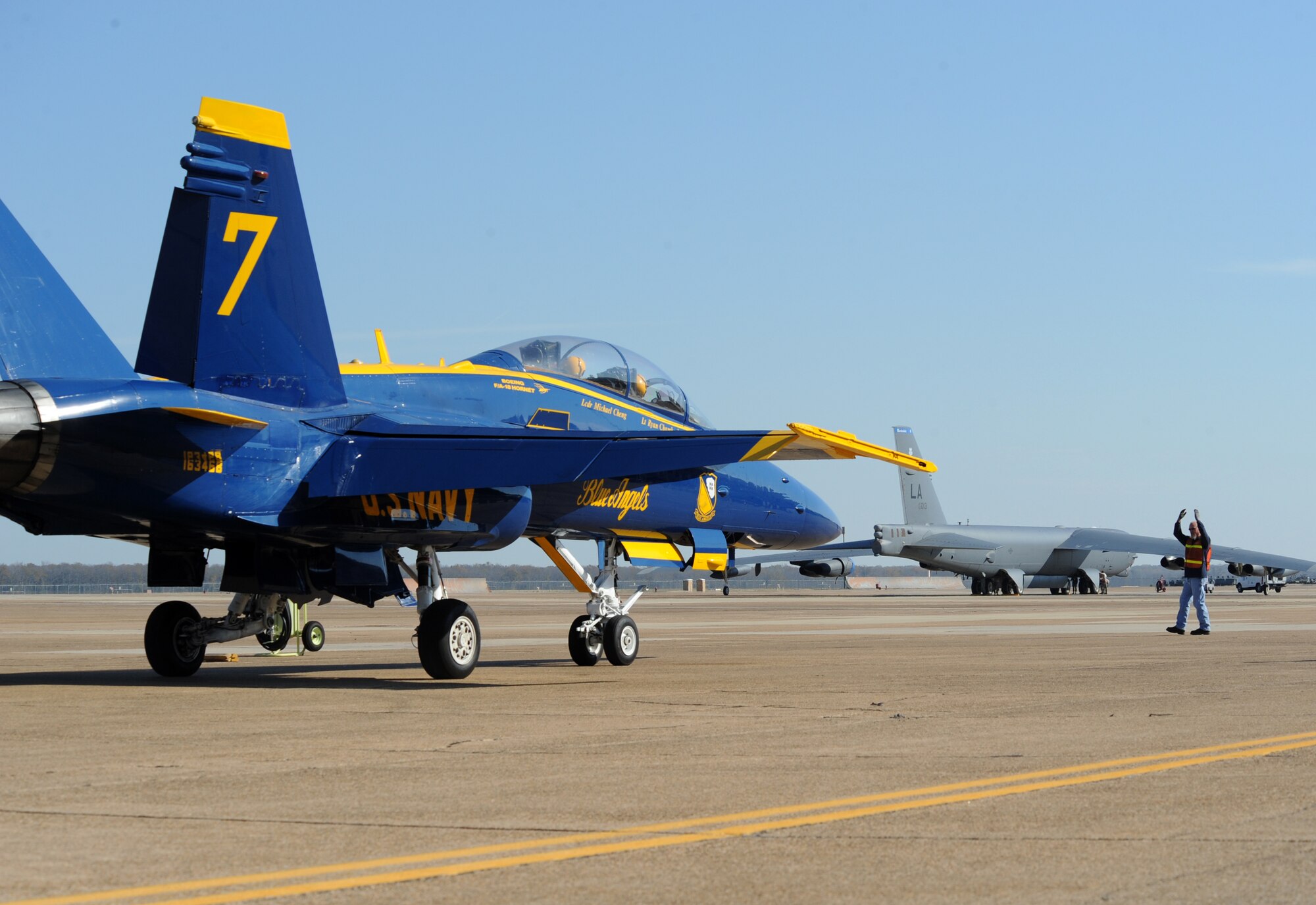 An F/A-18 Hornet from the United States Navy Flight Demonstration Team Blue Angels taxis into a parking spot on Barksdale Air Force Base, La., Nov. 19. The Blue Angels are comprised of pilots, maintainers and support servicemen from the U.S. Navy and U.S. Marines Corps and represent the best of the best their respective services have to offer. U.S. Navy Lt. Ryan Chamberlain and Lt. Cmdr. Michael Cheng visited Barksdale to start preliminary preparations with base organizations for the 2013 Defenders of Liberty Airshow scheduled for May 4-5. (U.S. Air Force photo/Airman 1st Class Benjamin Gonsier)(RELEASED)
