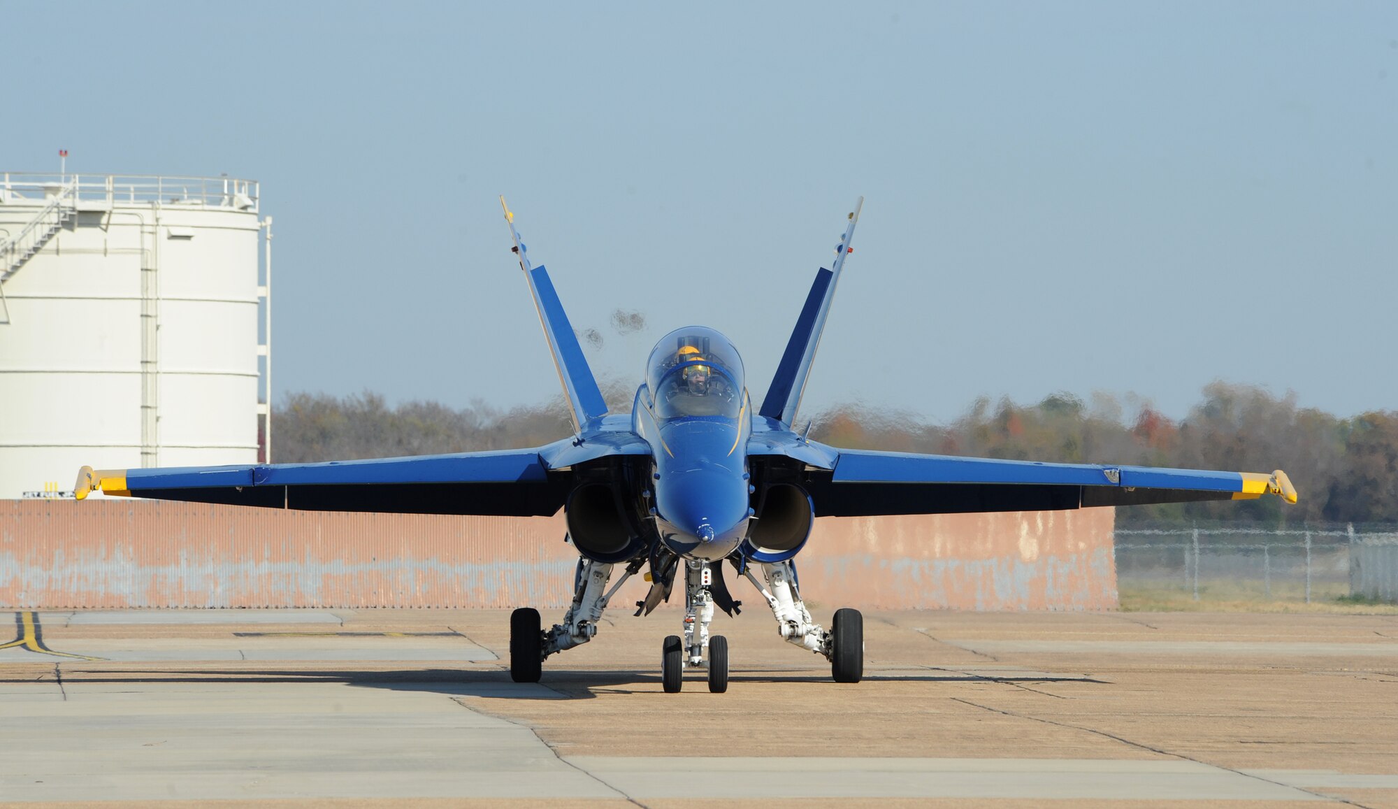 An F/A-18 Hornet from the United States Navy Flight Demonstration Team Blue Angels lands on Barksdale Air Force Base, La., Nov. 19. U.S. Navy Lt. Ryan Chamberlain and Lt. Cmdr. Michael Cheng visited Barksdale to start preliminary preparations with base organizations for the 2013 Defenders of Liberty Airshow scheduled for May 4-5. (U.S. Air Force Photo/Airman 1st Class Benjamin Gonsier)(RELEASED)
