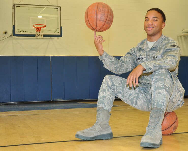 Airman 1st Class Aaron Brandon, 69th Maintenance Squadron, spins a basketball on his finger Nov. 15, 2012, at the Fitness Center on Grand Forks Air Force Base, N.D. Brandon accredited his co-workers as his inspiration to get the job done in the Air Force. (U.S. Air Force photo/Airman 1st Class Derek VanHorn)