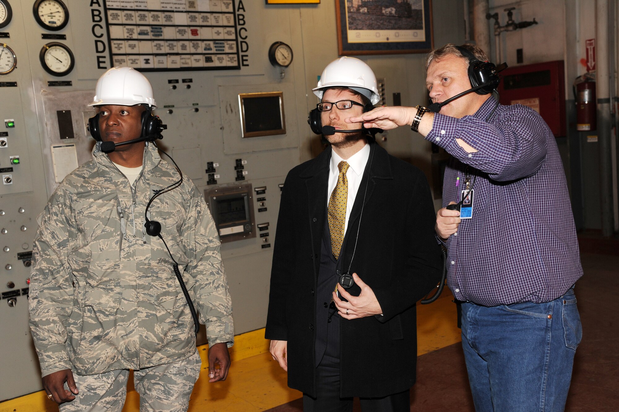 Marty Overlin, 354th Civil Engineer Squadron Central Heat and Power Plant superintendent, briefs Acting Under Secretary of the Air Force Dr. Jamie Morin and Col. Carl Jones, military assistant, about the different capabilities of the base power plant during a visit to Eielson Air Force Base, Alaska, Nov. 12, 2012. In addition to visiting with Eielson leadership and Airmen, Morin had the opportunity to speak with local civic leaders to discuss the unique capabilities the base provides to the Pacific theater of operations. (U.S. Air Force photo/Staff Sgt. Jim Araos)