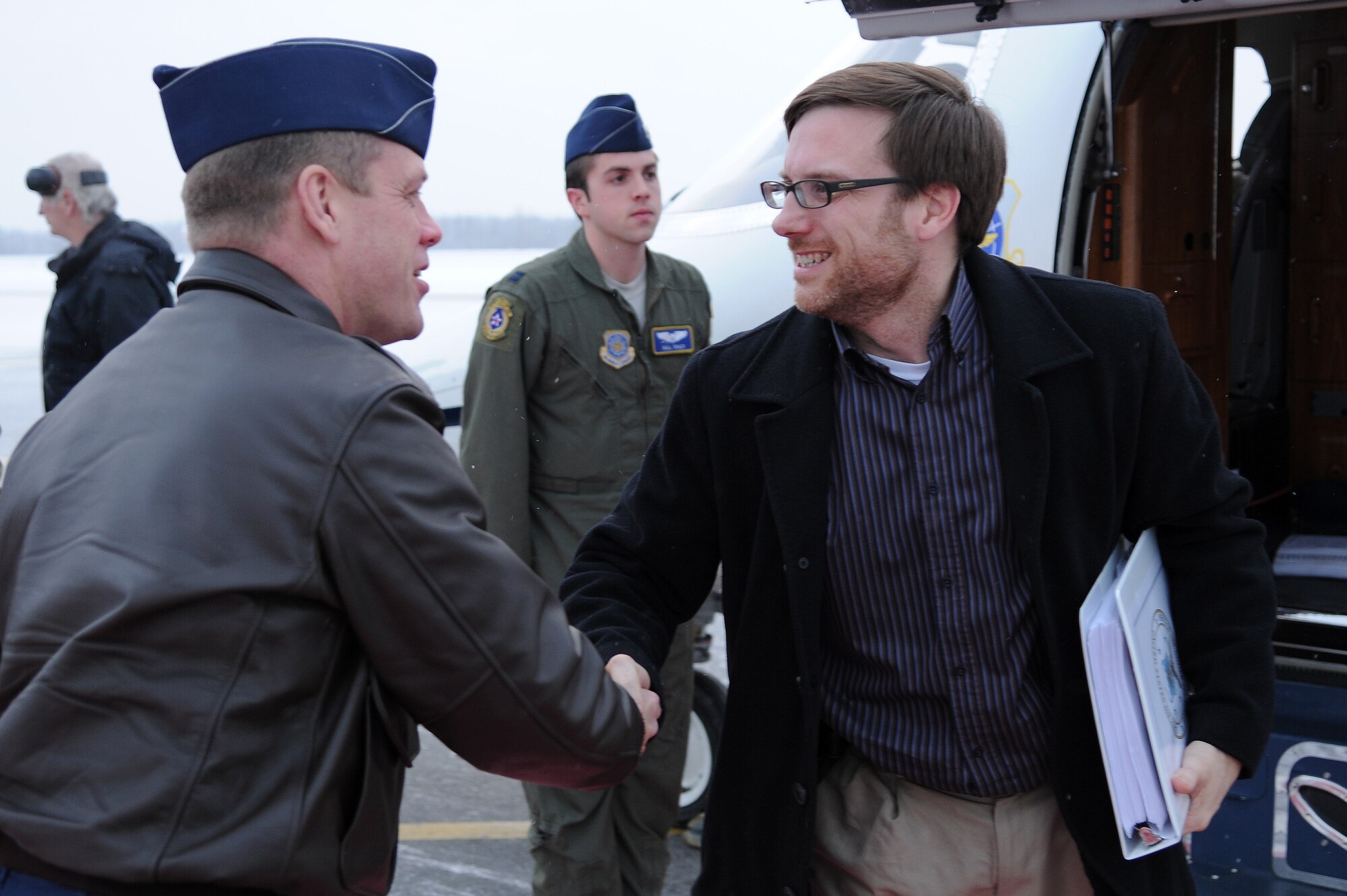 U.S. Air Force Col. Jay Aanrud, 354th Fighter Wing vice commander, greets Acting Under Secretary of the Air Force Dr. Jamie Morin during his first visit to Eielson Air Force Base, Alaska, Nov. 12, 2012. During his visit, Morin learned about the mission of the 354th Fighter Wing and the unique capabilities the base provides to the Pacific theater of operations. (U.S. Air Force photo/Staff Sgt. Jim Araos)