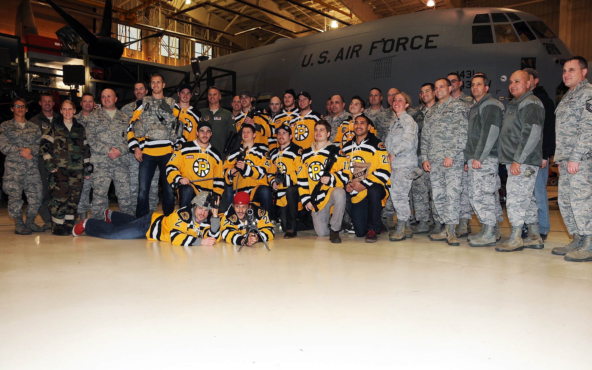 Players and Staff Members from the Providence Bruins and Staff Members from the Boston Bruins visited the Rhode Island National Guard at the 143d Airlift Wing, Quonset Air National Guard Base, North Kingstown, Rhode Island. National Guard Photo by Master Sgt. Janeen Miller (RELEASED)