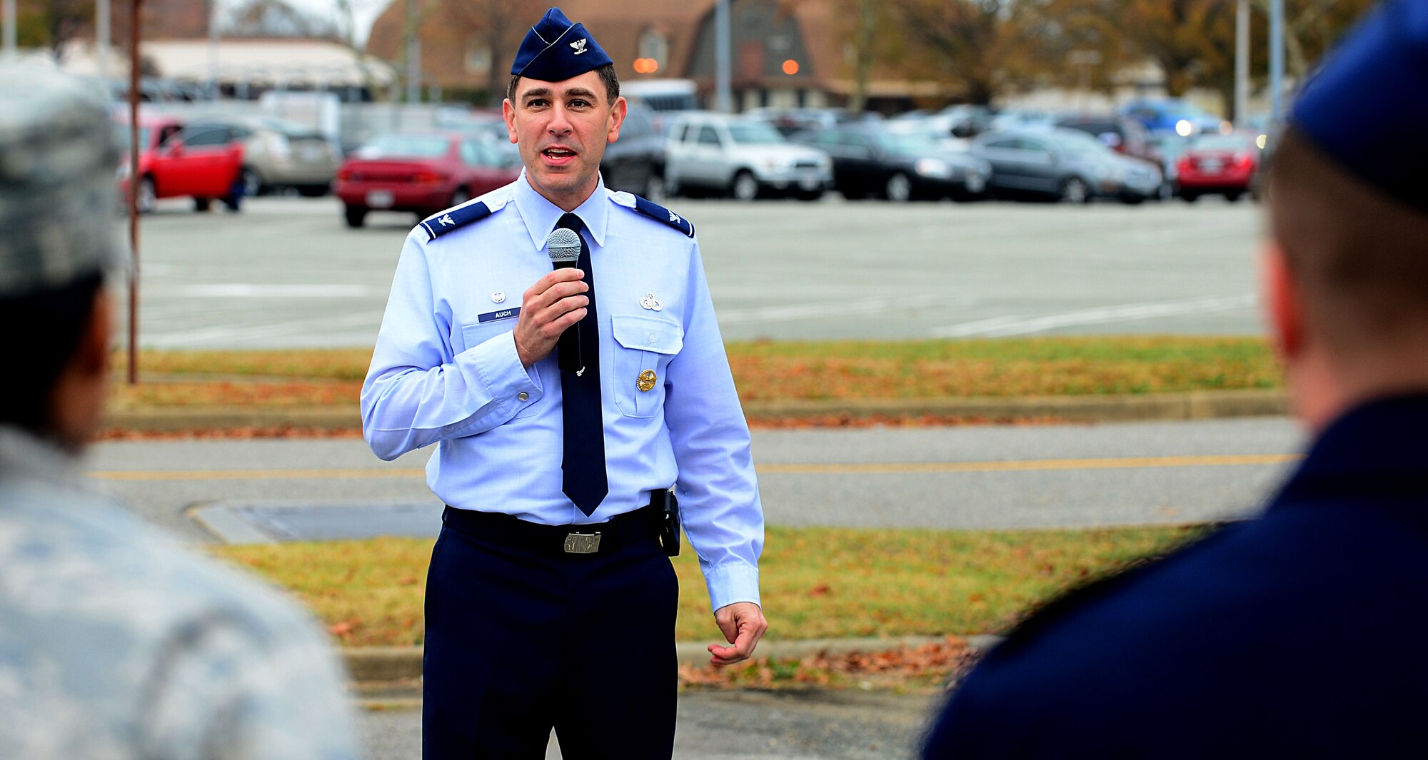 U.S. Air Force Col. Korvin Auch, 633rd Air Base Wing commander, speaks to volunteers of Operation Warmheart at Langley Air Force Base, Va., Nov. 19, 2012.  Volunteers donated a variety of Thanksgiving staples; including stuffing, pie, canned vegetables and cornbread mix for the Thanksgiving baskets.  (U.S. Air Force photo by Airman 1st Class Kayla Newman/Released)