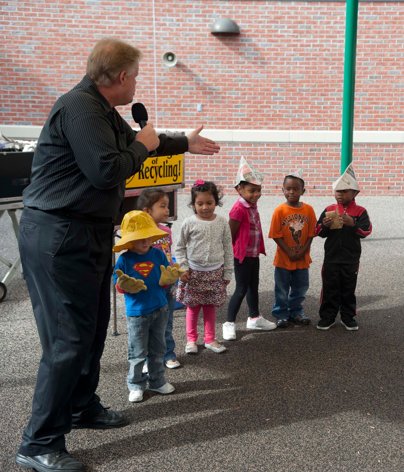 Greg Allen, The Magic of Recycling presenter, chooses volunteers for an interactive magic trick at the Child Development Center, Moody Air Force Base, Ga., Nov. 13, 2012. Allen discussed how throwing away trash doesn’t make the garbage disappear, but if you recycle, paper, bottles and plastic can be reused. (U.S. Air Force photo by Airman 1st Class Paul Francis/Released)
