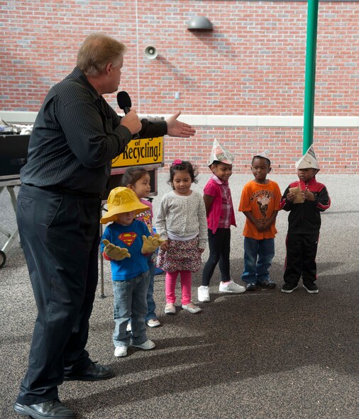 Greg Allen, The Magic of Recycling presenter, chooses volunteers for an interactive magic trick at the Child Development Center, Moody Air Force Base, Ga., Nov. 13, 2012. Allen discussed how throwing away trash doesn’t make the garbage disappear, but if you recycle, paper, bottles and plastic can be reused. (U.S. Air Force photo by Airman 1st Class Paul Francis/Released)

