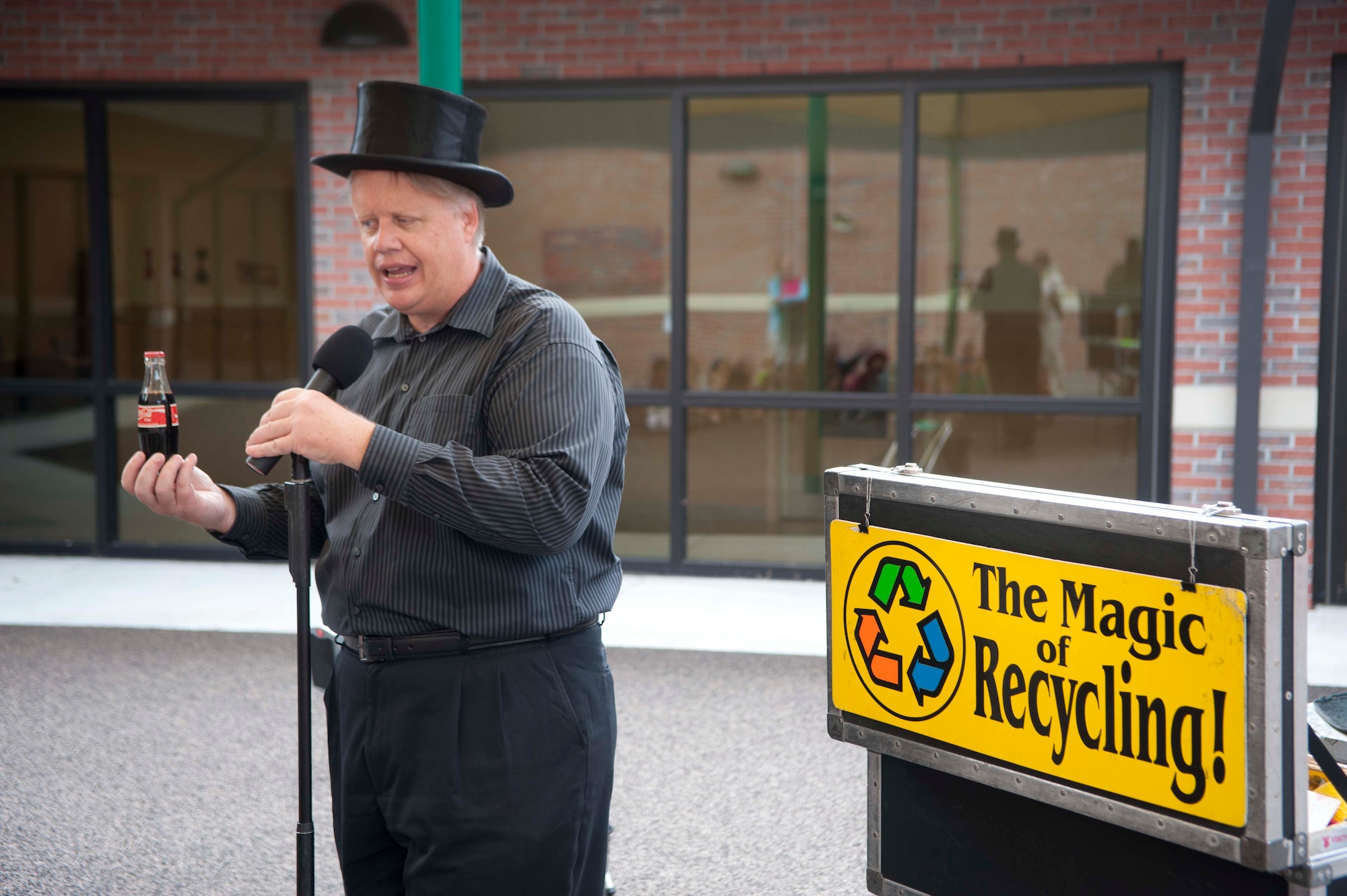 Children at Moody Air Force Base, Ga., take part in America Recycles Day at the Child Development Center with The Magic of Recycling magic show by Greg Allen Nov. 13, 2012.The performance was a 45-minute magic show that demonstrated the importance of recycling and its effects on the environment. (U.S. Air Force photo by Airman 1st Class Paul Francis/Released)
