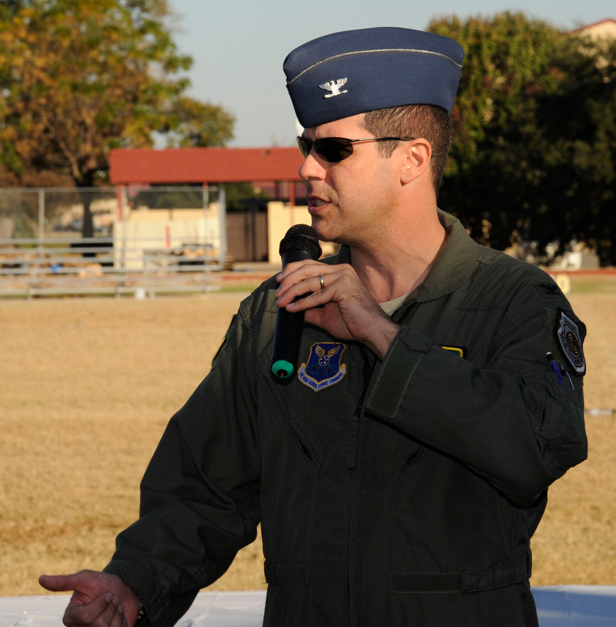Col. Andrew Gebara, 2nd Bomb Wing commander, addresses members of Team Barksdale during the closing ceremony of the 2012 Sports Day on Barksdale Air Force Base, La., Nov. 16. Sports Day is comprised of various competitive athletic events to help promote physical fitness,health and wellness. (U.S. Air Force photo/Airman 1st Class Andrew Moua)(RELEASED)