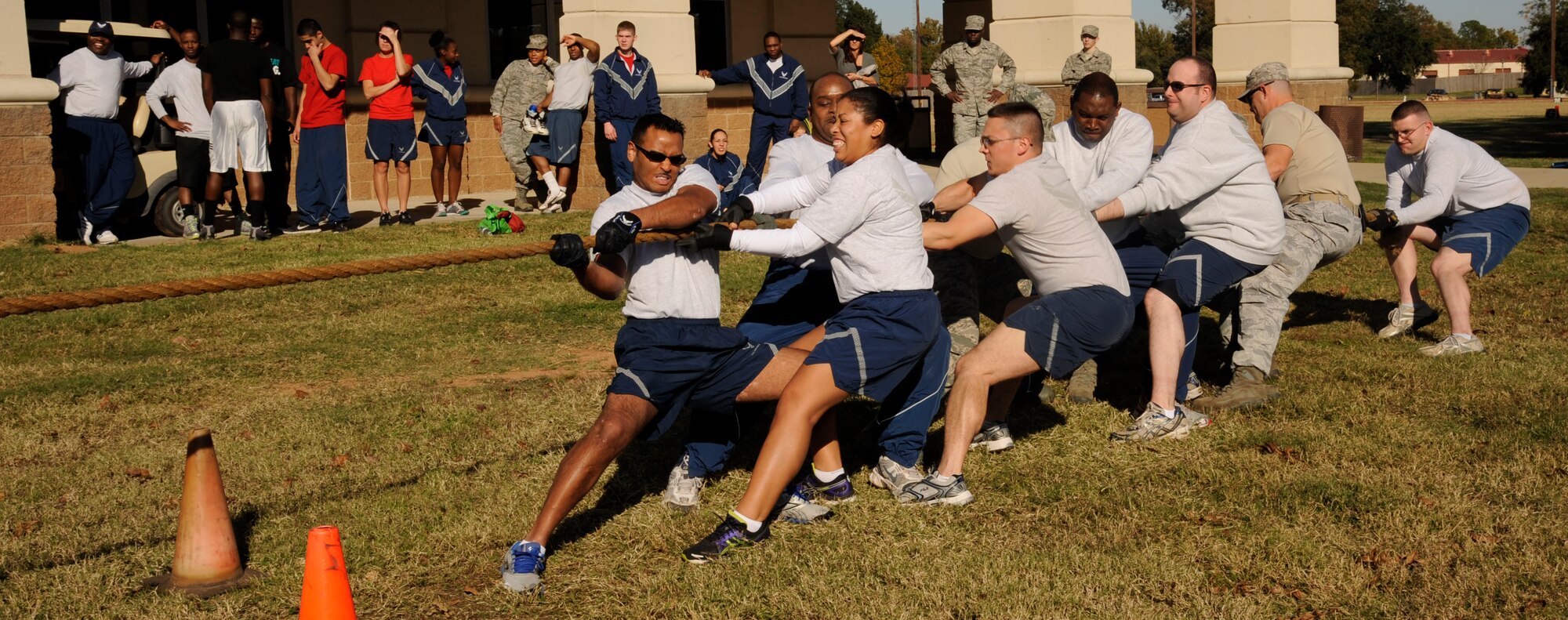 Team Barksdale members participate in a game of tug-of-war during the 2012 Sports Day on Barksdale Air Force Base, La., Nov. 16. Sports Day was designed to improve teamwork and promote the Air Force's Fit-to-Fight mission. (U.S. Air Force photo/Airman 1st Class Andrew Moua)(RELEASED)