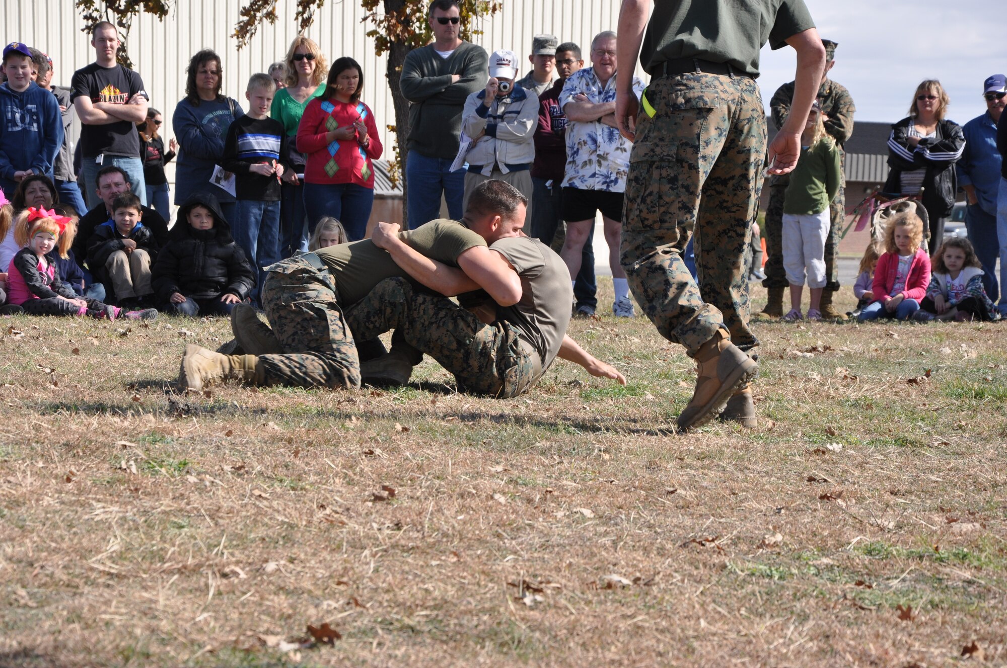 GOODFELLOW AIR FORCE BASE, Texas- Marines from the Marine Corps Detachment demonstrate military martial arts for the public at the Community Appreciation Day and the 32nd Annual Santa’s Market event at the Louis F. Garland Fire Academy here Nov. 17. The event was open to the public for free and featured many demonstrations and vendors. (U.S. Air Force photo/ Airman 1st Class Erica Rodriguez)