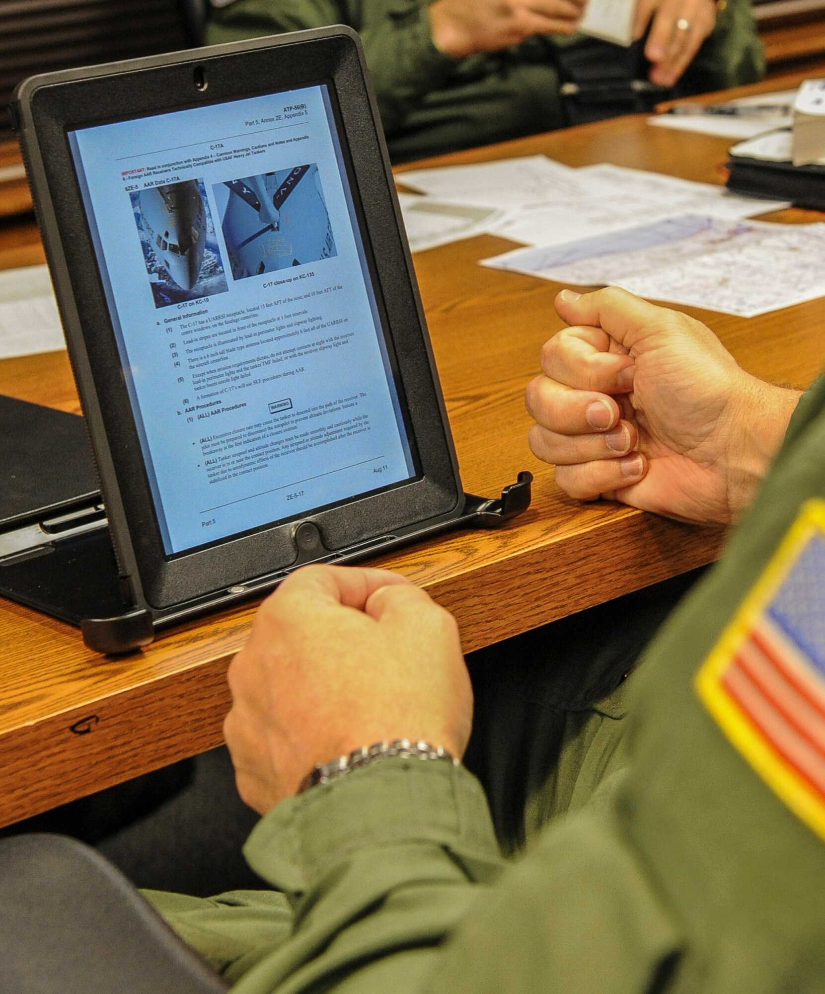 Fairchild aircrew members from the 92nd Air Refueling Squadron use tablets as they review flight plans in base operations at Fairchild Air Force Base, Wash., Nov. 15, 2012. The crew refueled a C-17 Globemaster III from the 62nd Air Mobility Wing at Joint Base Lewis-McChord, Wash. (U.S. Air Force photo by Senior Airman Benjamin Stratton)
