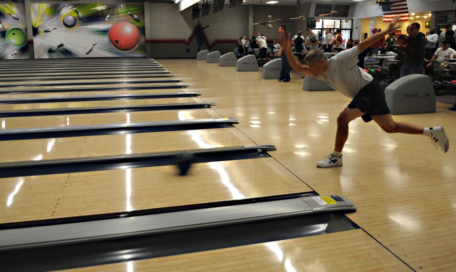 Lt. Col. Tony Presicci, 2nd Dental Squadron chief of general dentistry, bowls during the 2012 Sports Day on Barksdale Air Force Base, La., Nov. 16. Sports Day consists of various team events including dodgeball, basketball, soccer, tug-of-war, volleyball, a homerun derby, flag football and racquetball. This day was designed to improve team work and help increase the awareness of fitness, sports programs and boost morale. (U.S. Air Force photo/ Senior Airman Kristin High)(RELEASED)