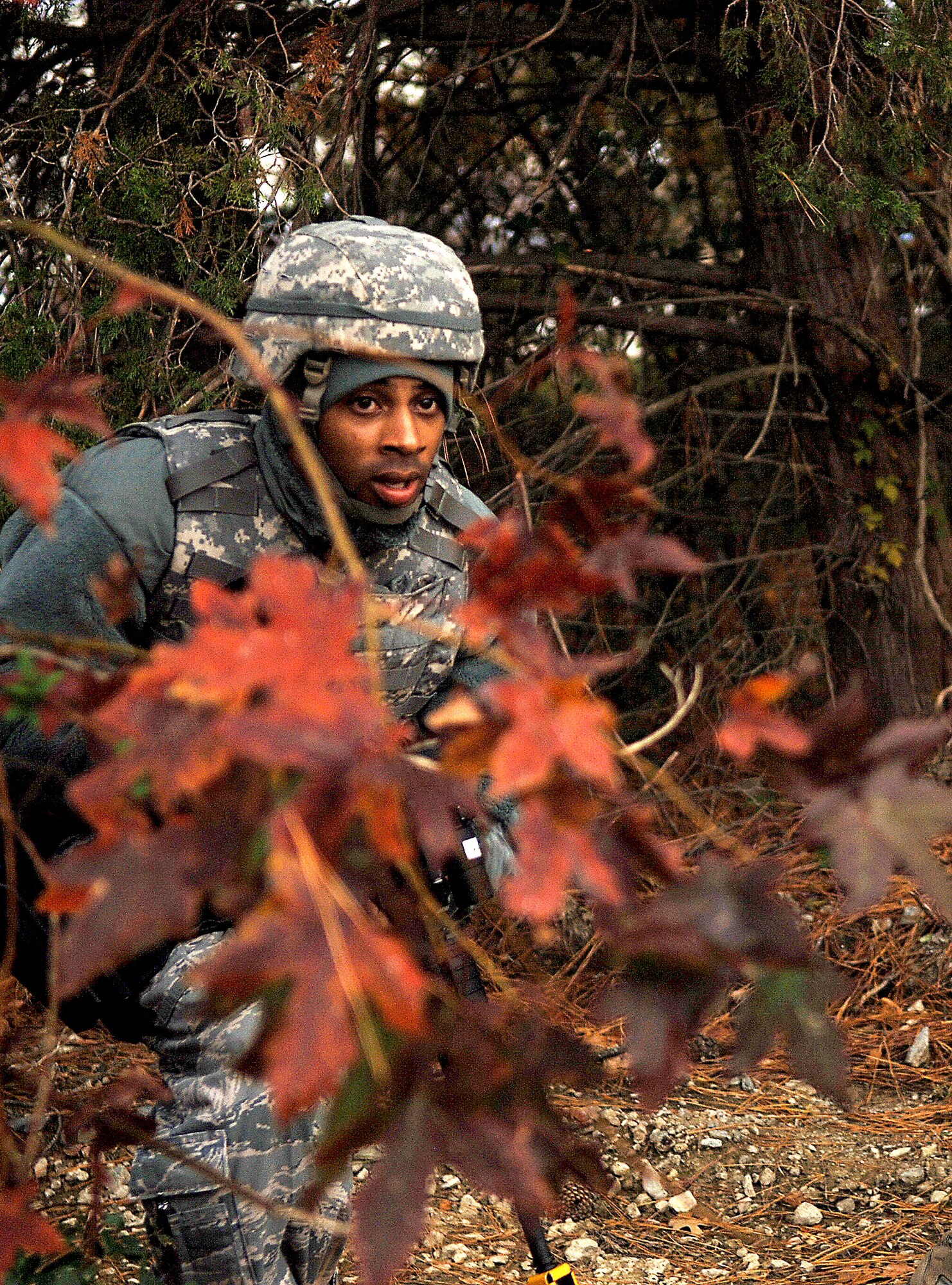 Staff Sgt. Ervin Faison, 633rd Security Forces Squadron emergency control center operator, responds to an active shooter during a training exercise at Langley Air Force Base, Va., Nov. 15, 2012.  The exercise tested security forces’ ability to respond and neutralize an active shooter threat. (U.S. Air Force photo by Staff Sgt. Katie G. Ward / Released)